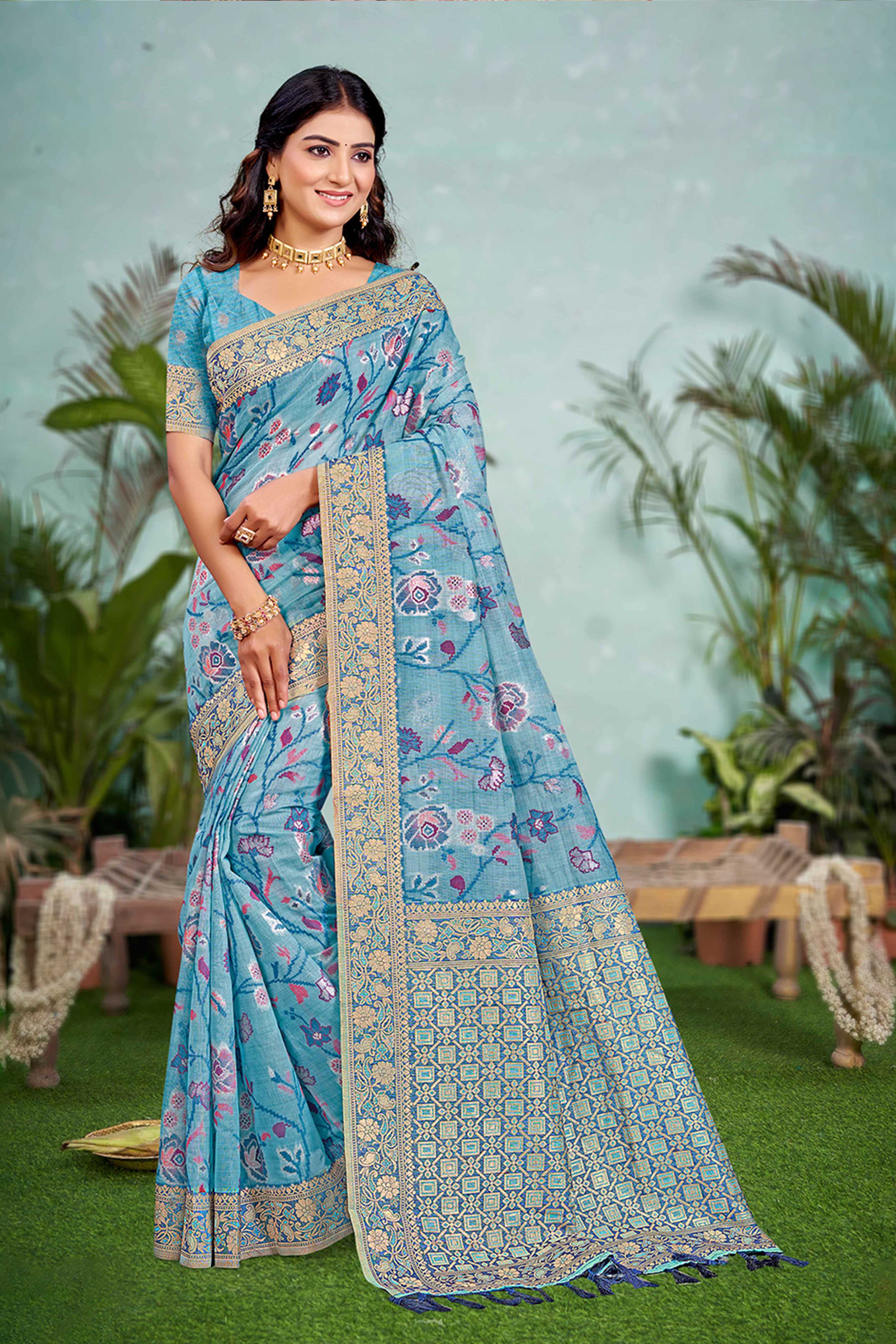 Captivating Blue Floral Zari Weaving Cotton Silk Saree Accented With Tassel Pallu