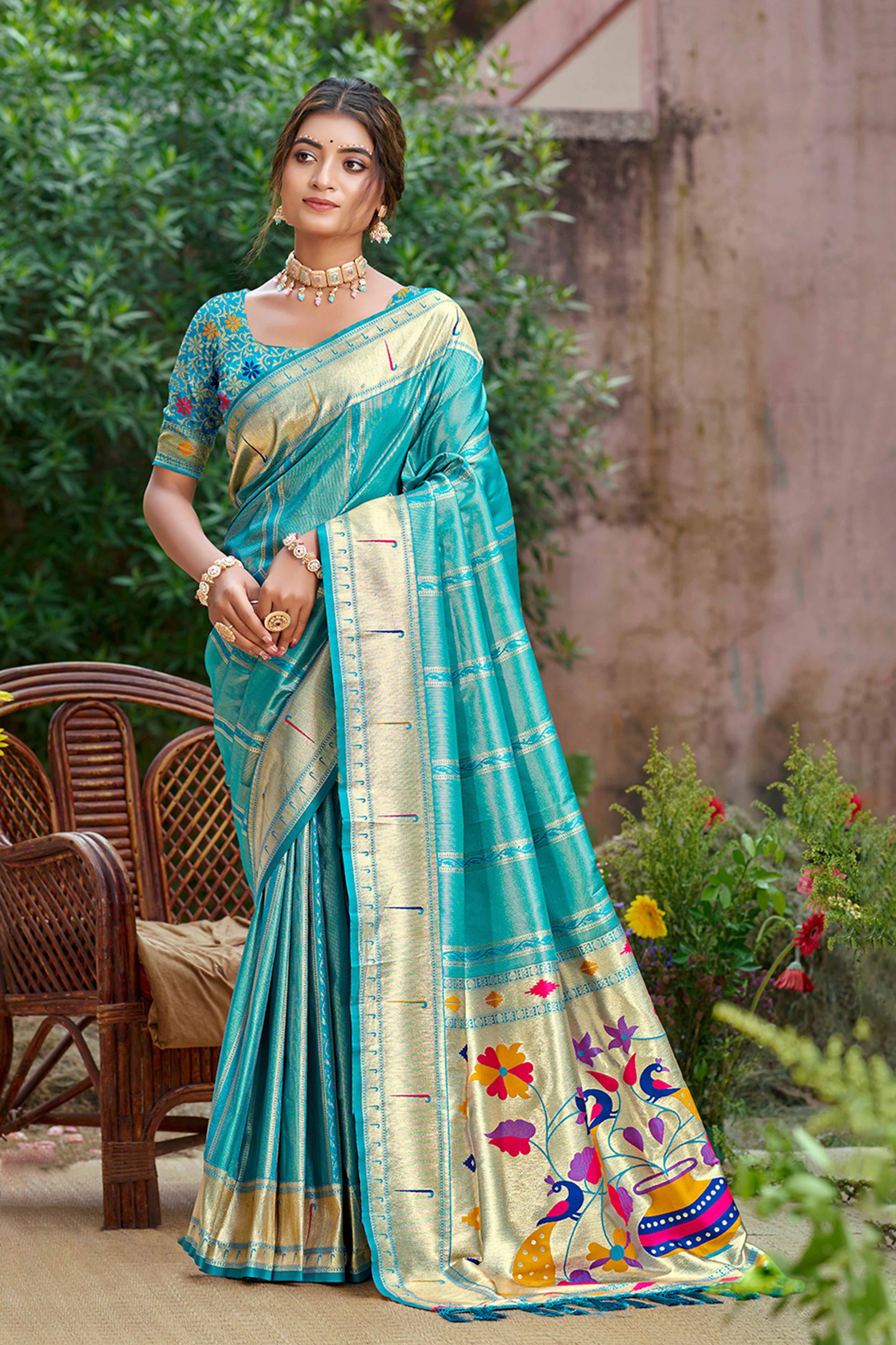 Turquoise Blue Designer Weaving Silk Blend Saree Accented With Graceful Peacock & Floral Motif Pallu