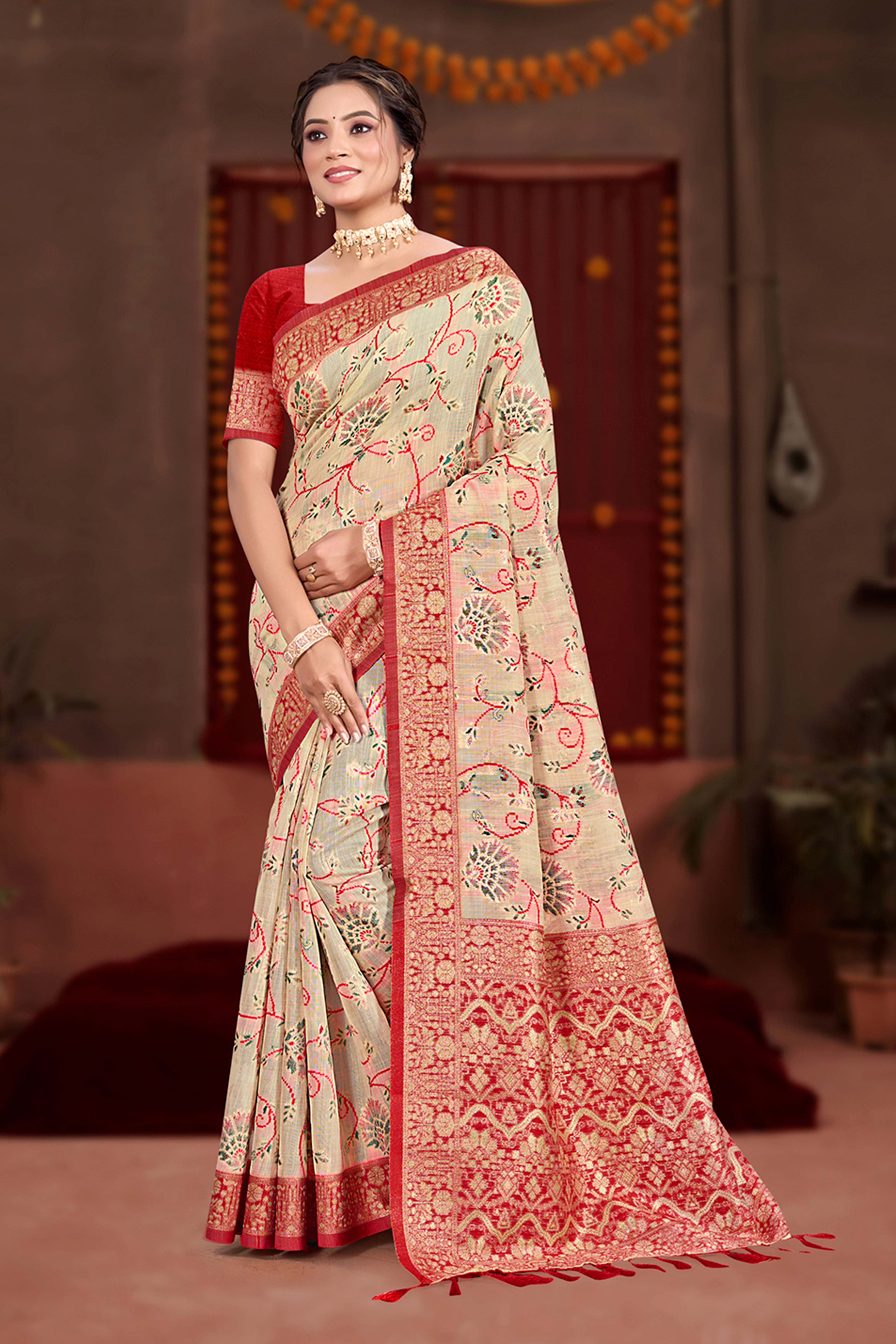 Elegant Beige Cotton Silk Saree Adorned With Floral Weaving & Graceful Tassel Pallu