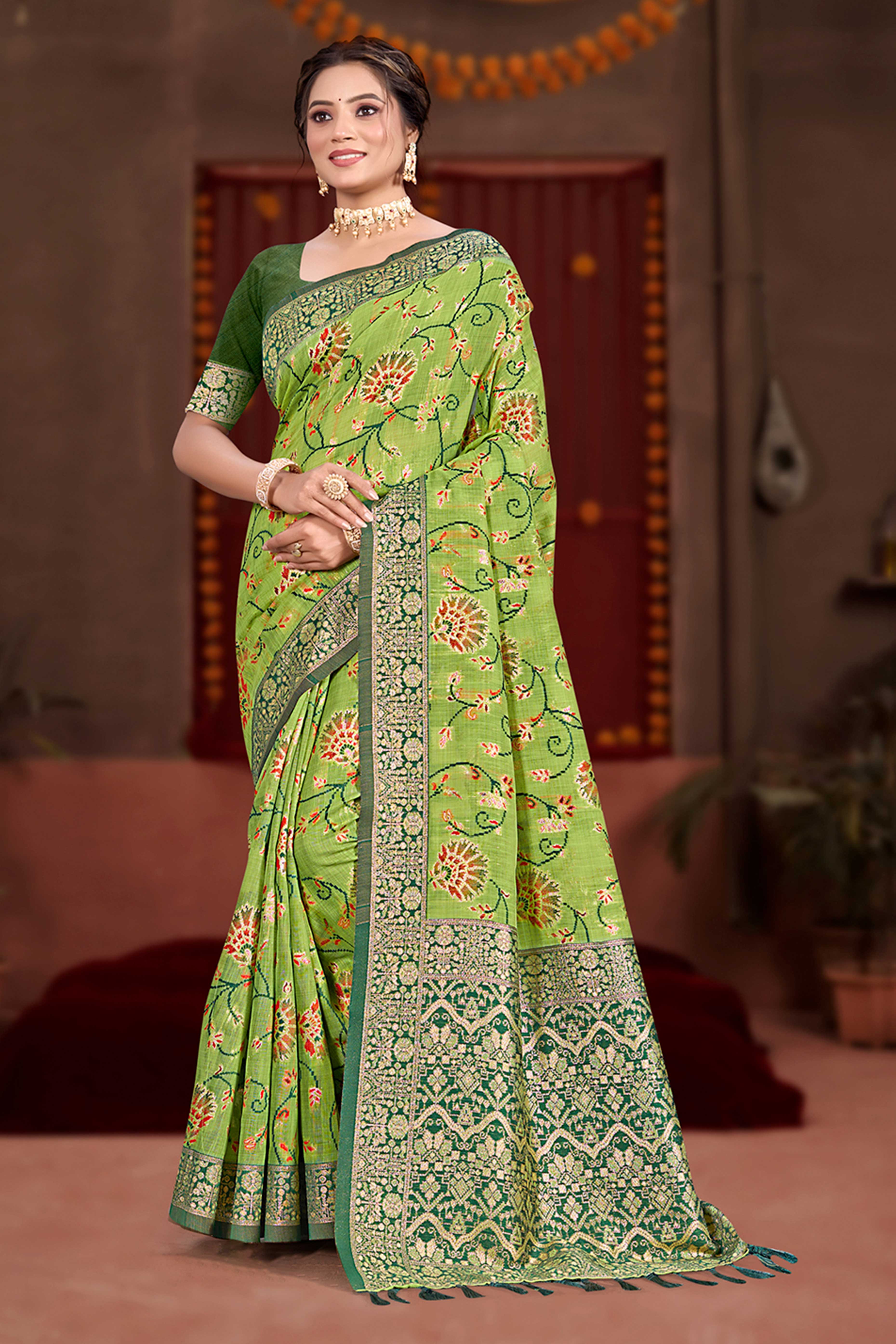 Elegant Green Cotton Silk Saree Adorned With Floral Weaving & Graceful Tassel Pallu
