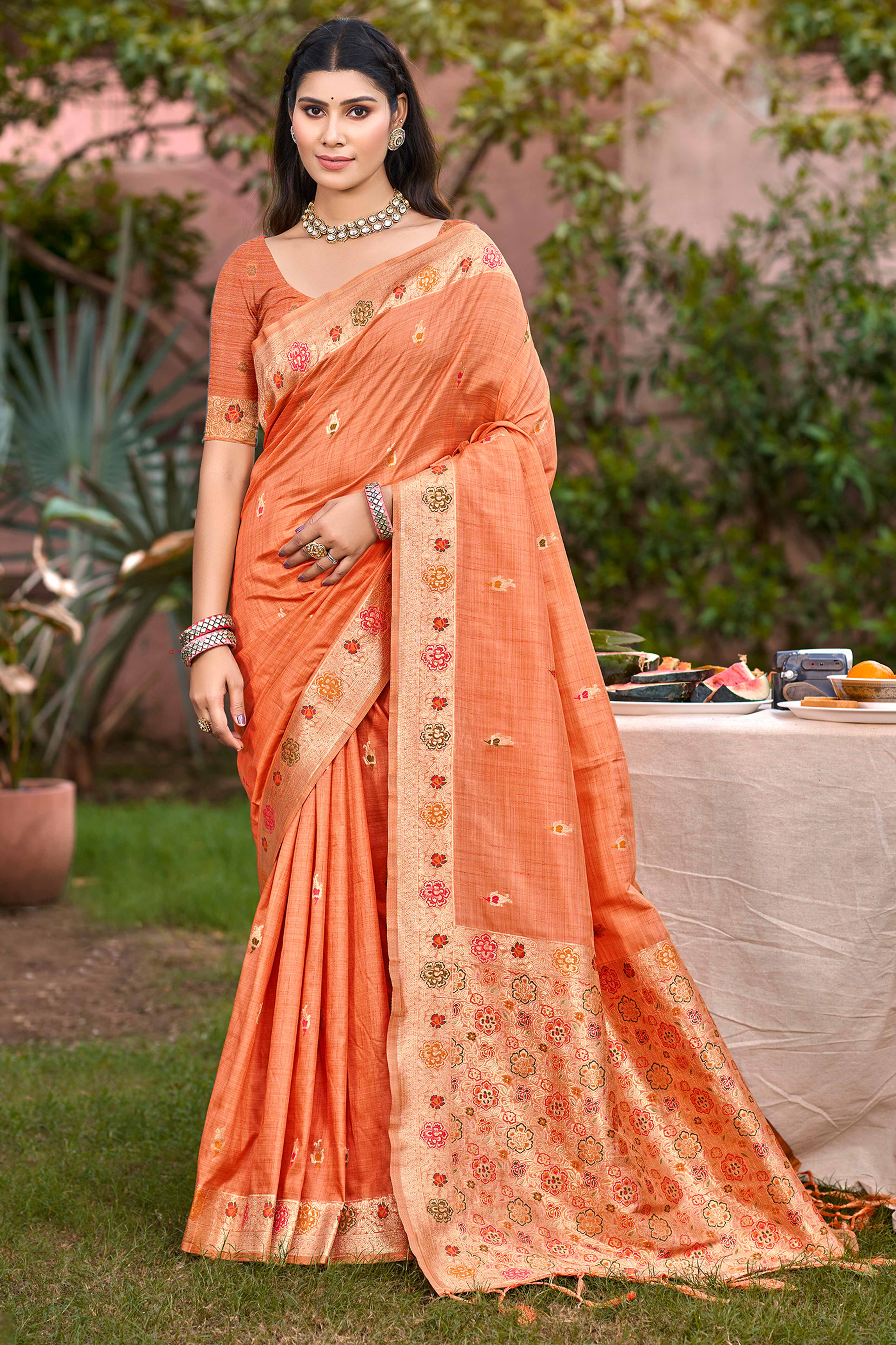 Orange Assam Silk Blend  Saree Featuring Intricate Floral Zari Weave & Tassel Pallu