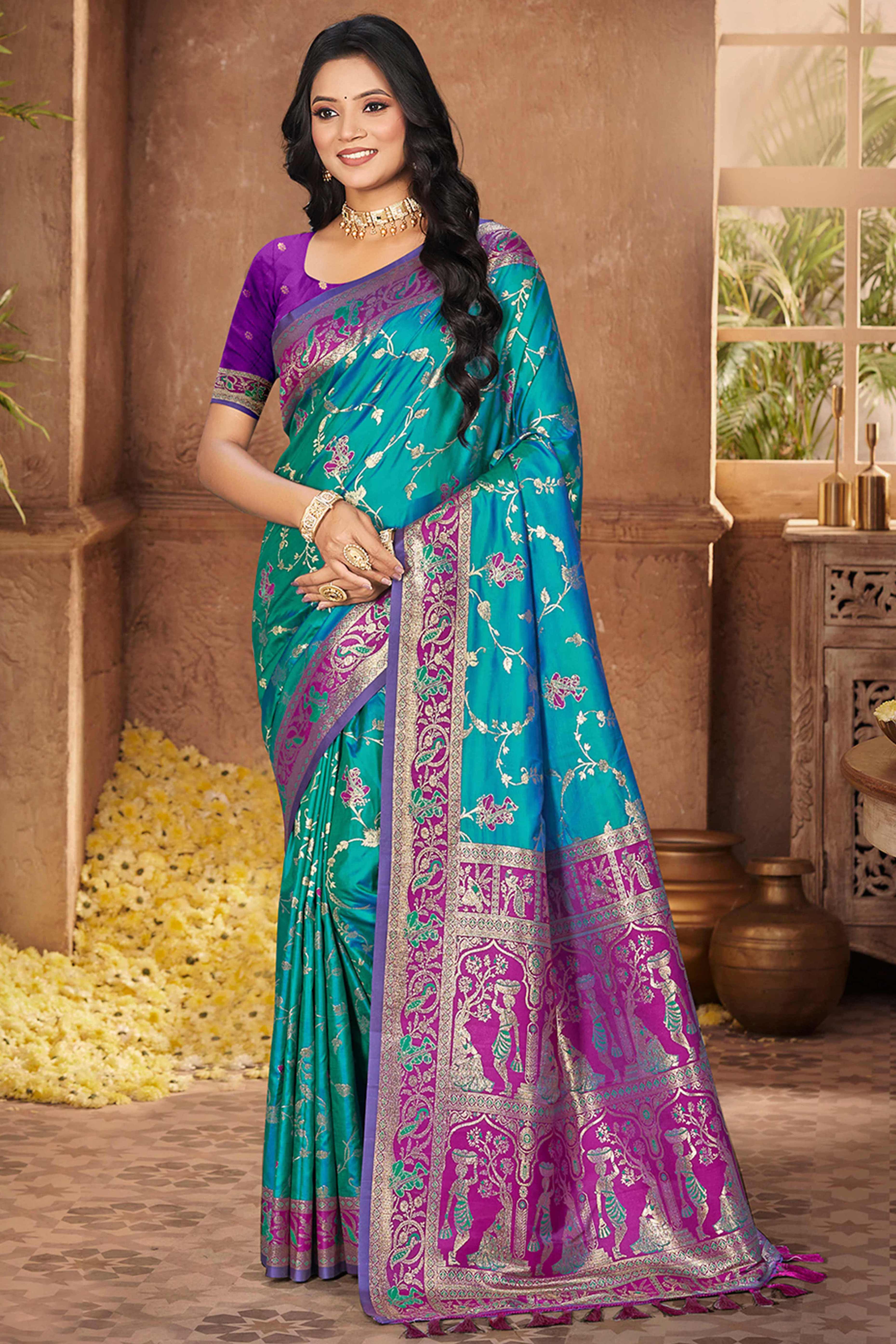 Radiant Rama Blue Floral Zari Weaving Silk Blend Saree With Tassel Pallu