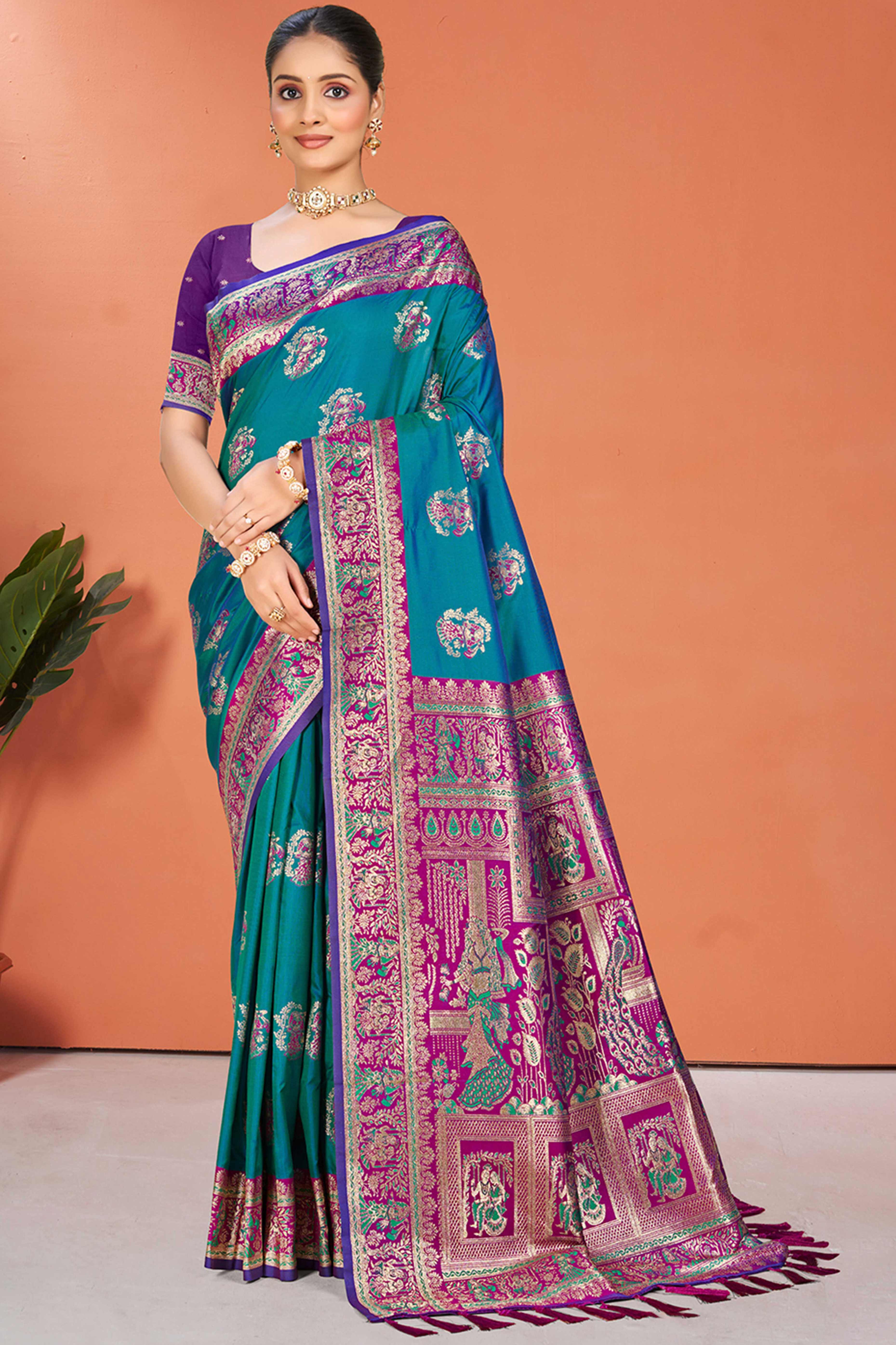 Morpich Blue Traditional Zari Weaving Silk Blend Saree Accented With Tassel Pallu