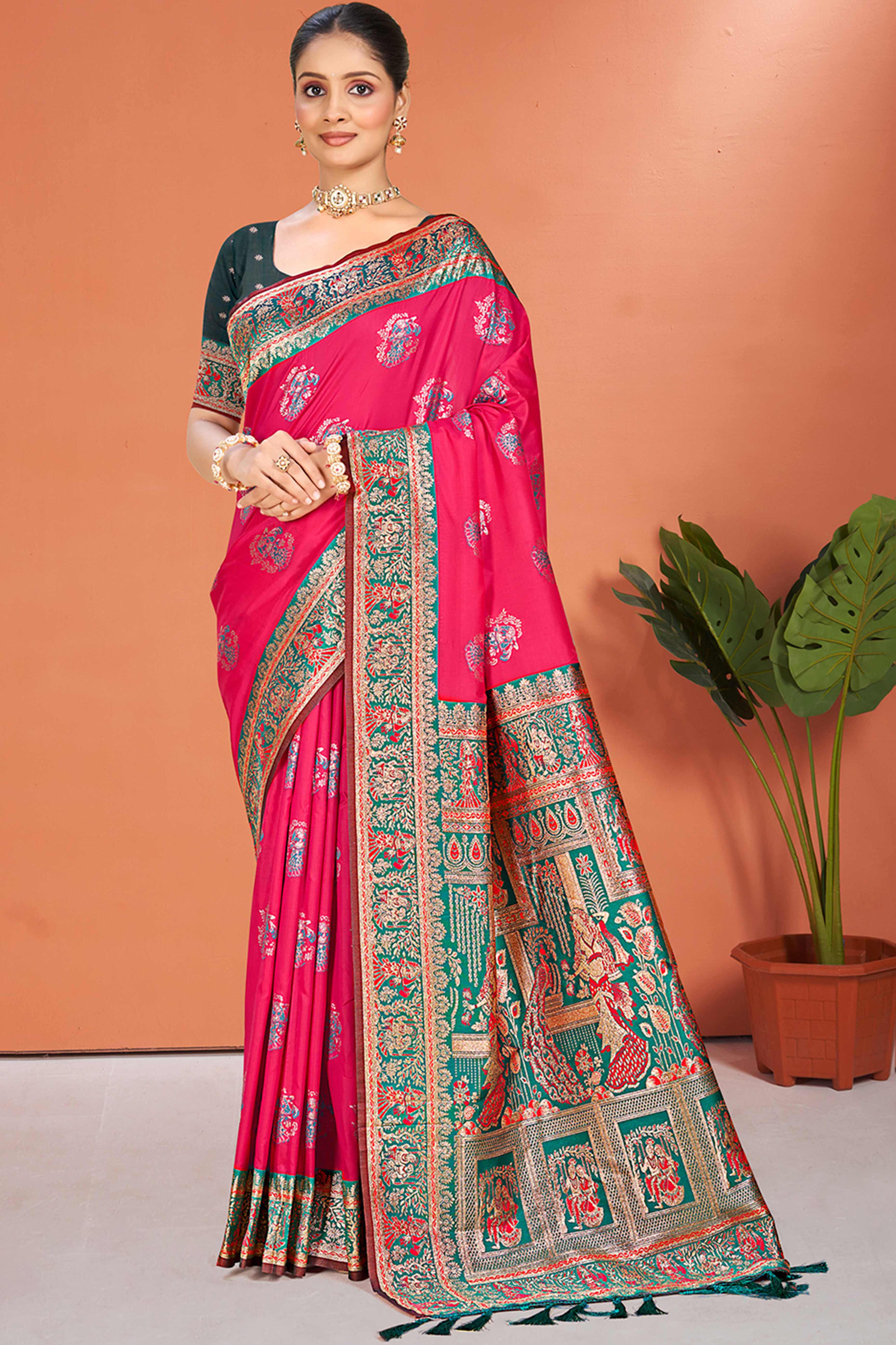 Pink Traditional Zari Weaving Silk Blend Saree Accented With Tassel Pallu