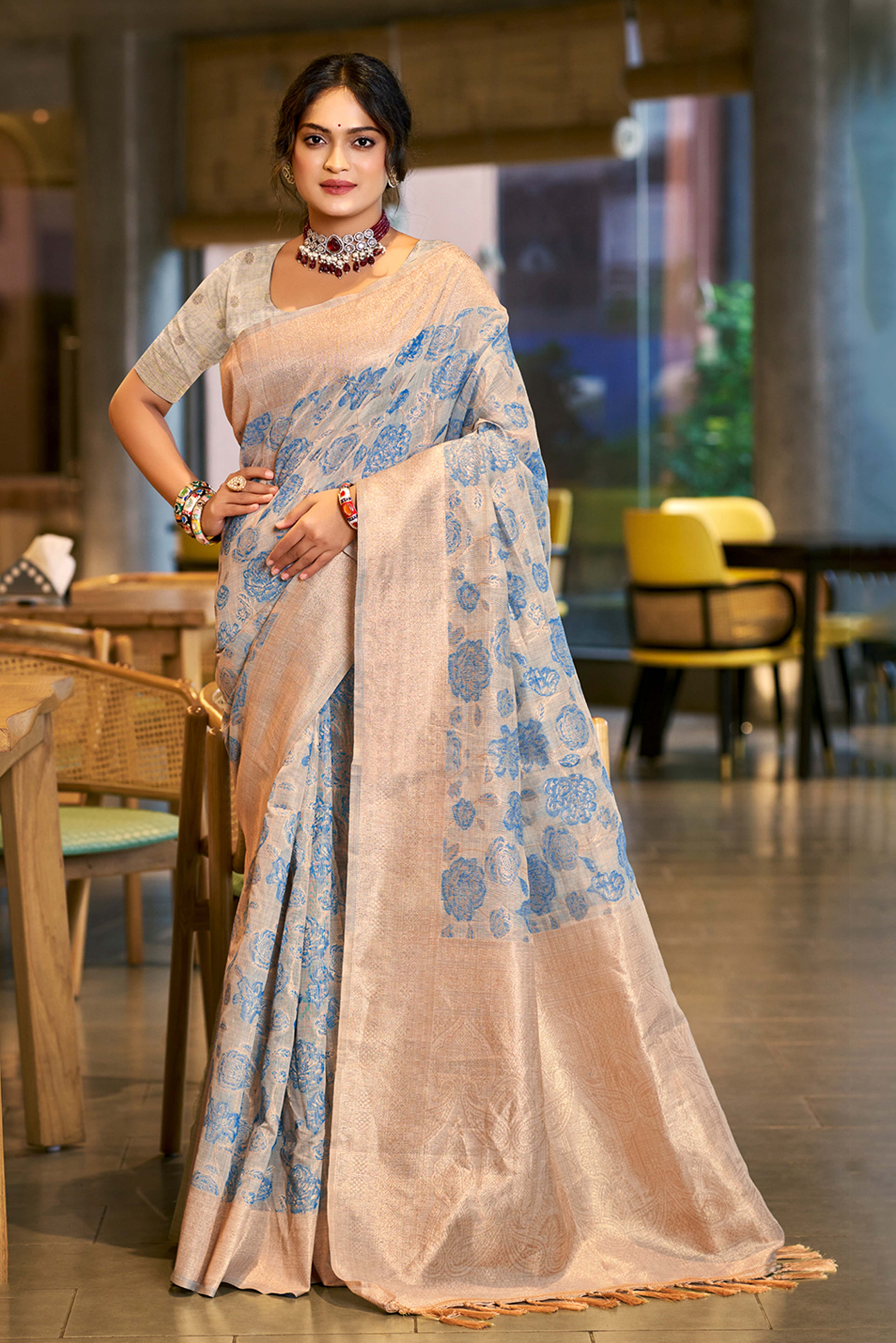 Blue Premium Cotton Silk Saree Highlighted With Floral Weaving Work & Tassel Pallu