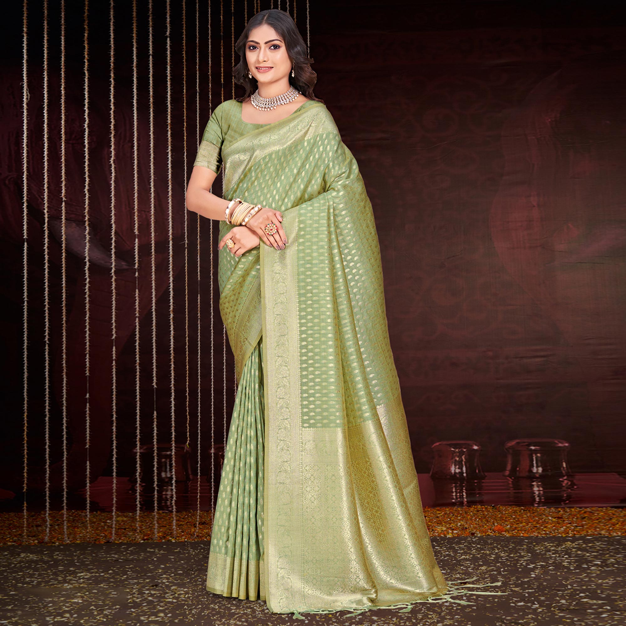 Green Floral Woven Cotton Silk Saree With Tassels