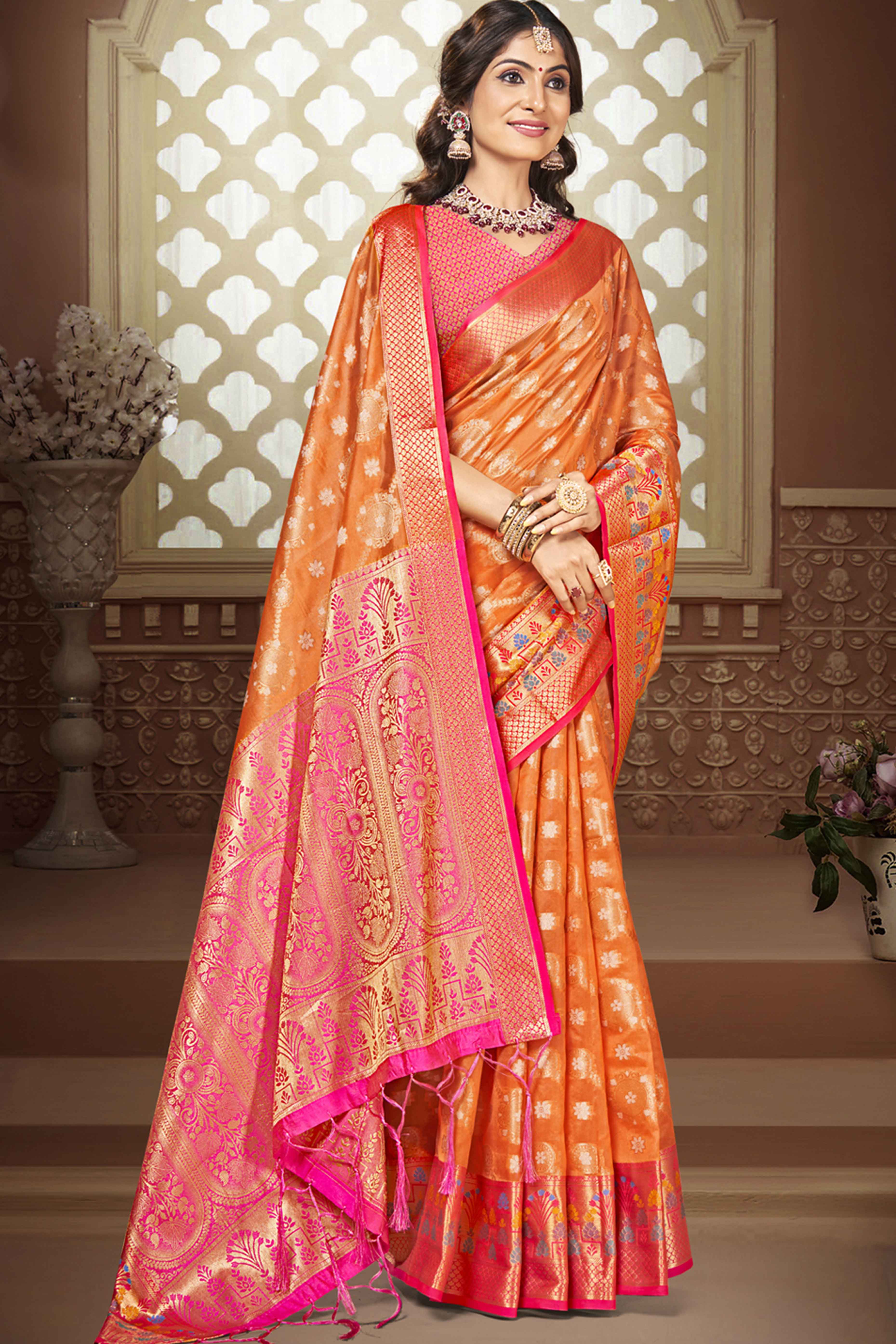 Orange Floral Woven Banarasi Silk Saree With Tassels