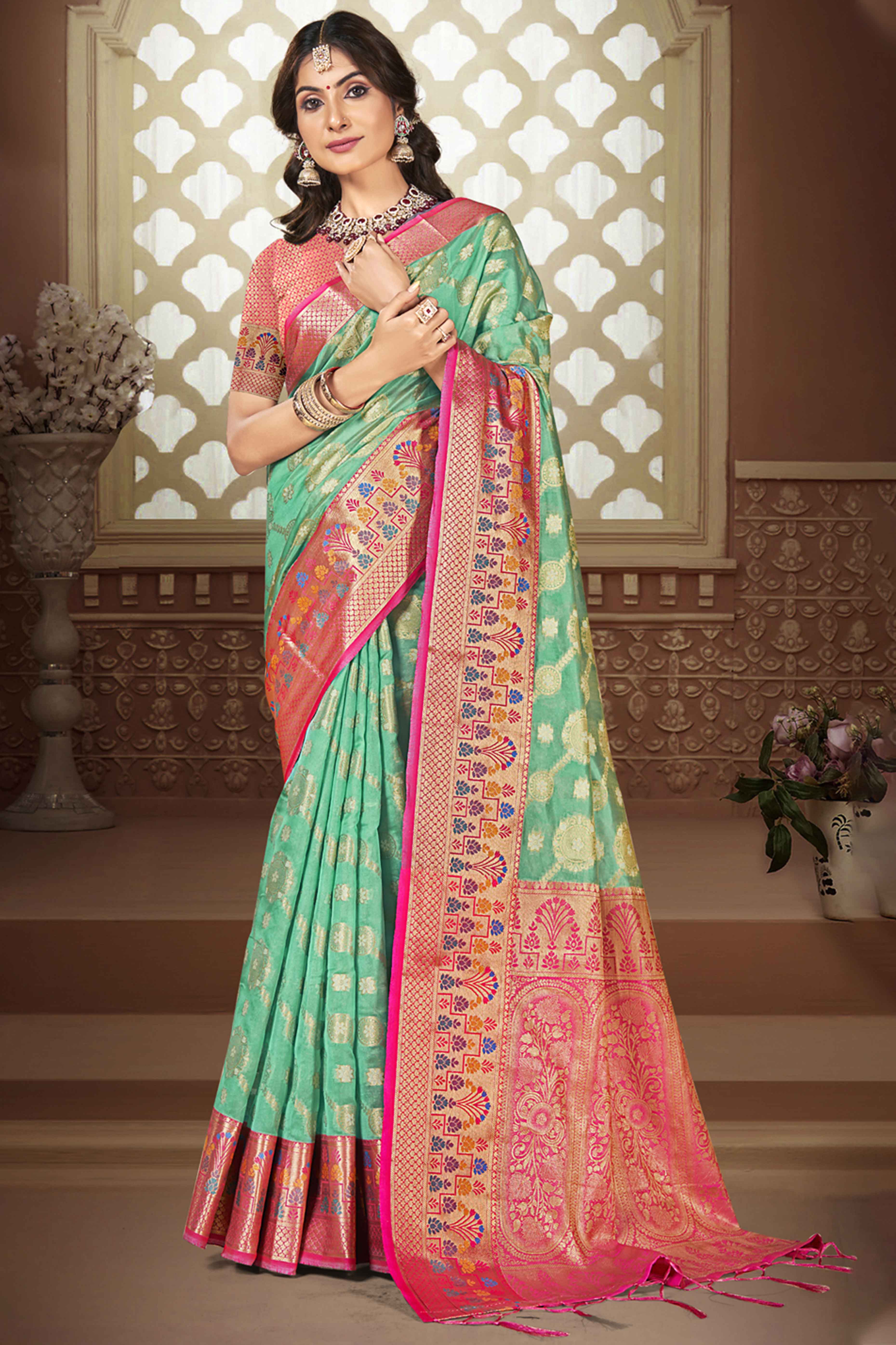 Sea Green Floral Woven Banarasi Silk Saree With Tassels