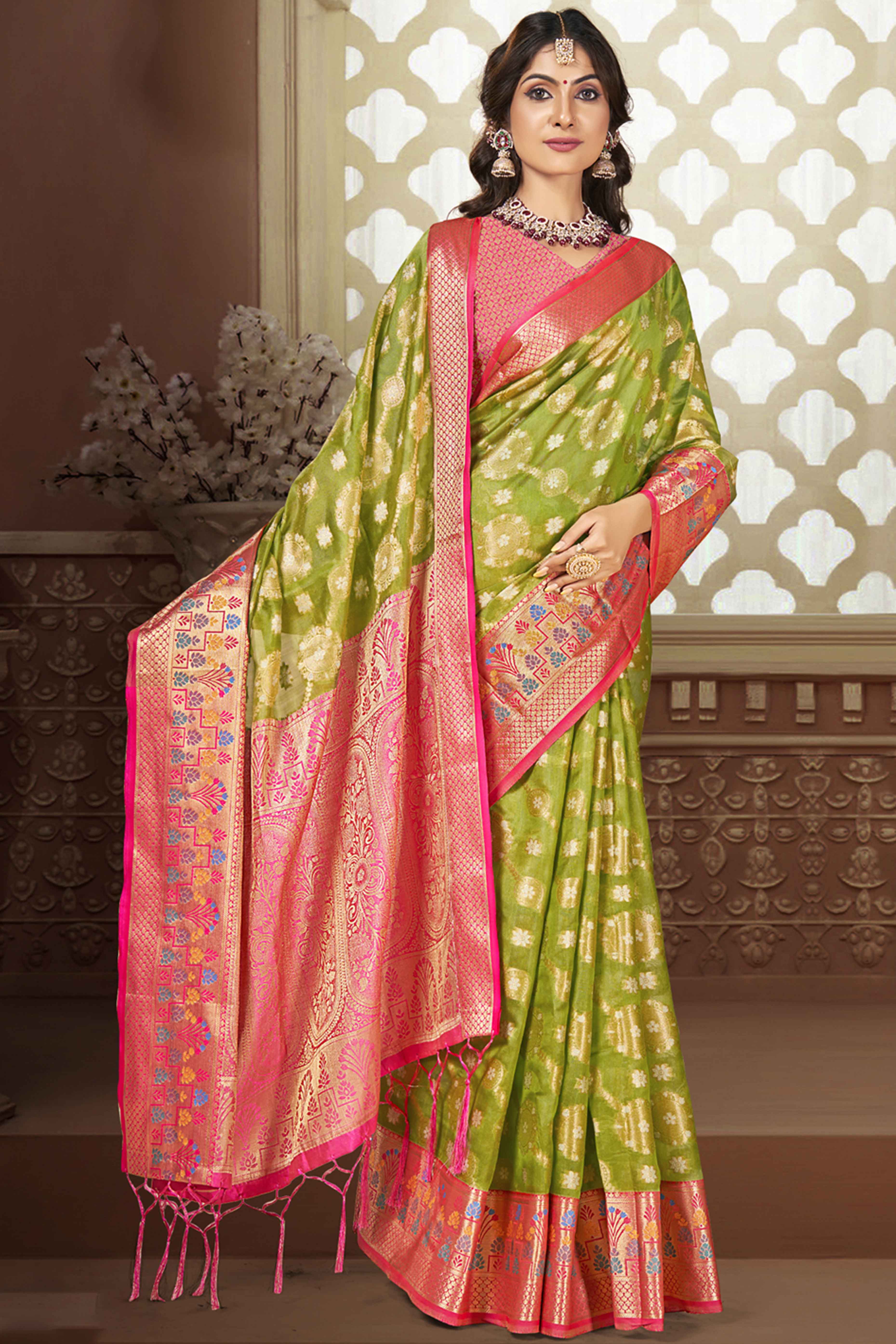 Green Floral Woven Banarasi Silk Saree With Tassels