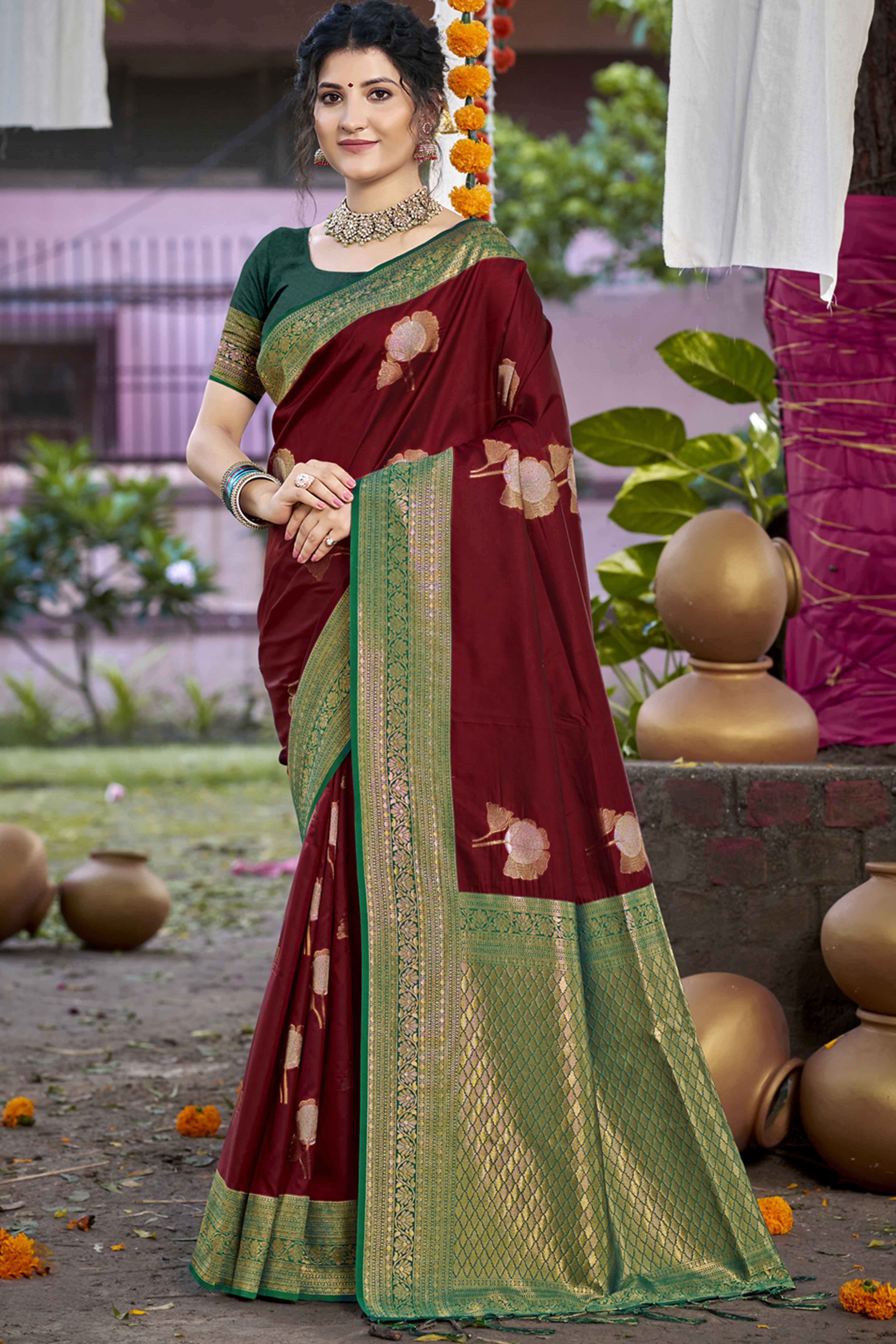 Maroon Floral Woven Banarasi Silk Saree With Tassels