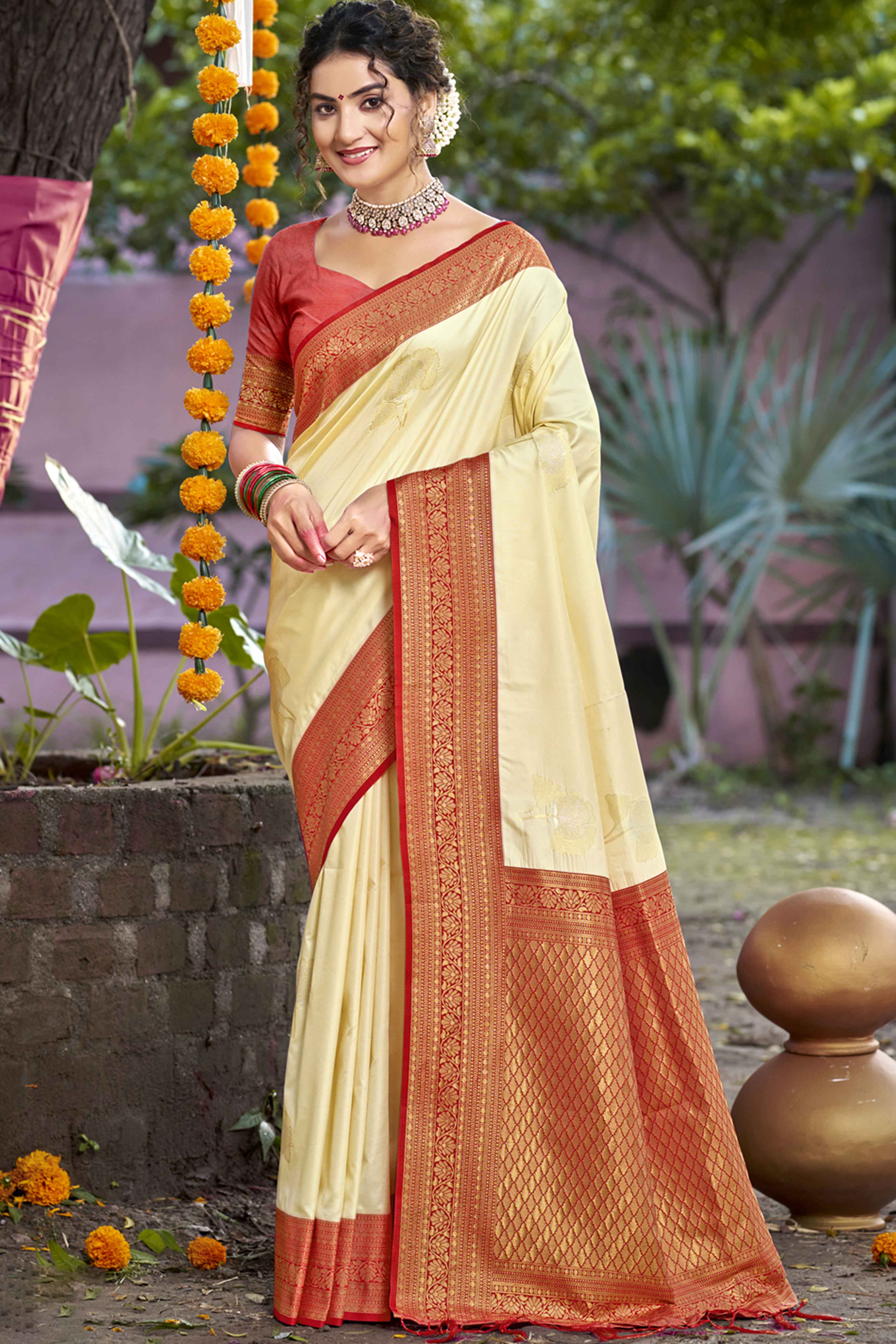 Cream Floral Woven Banarasi Silk Saree With Tassels