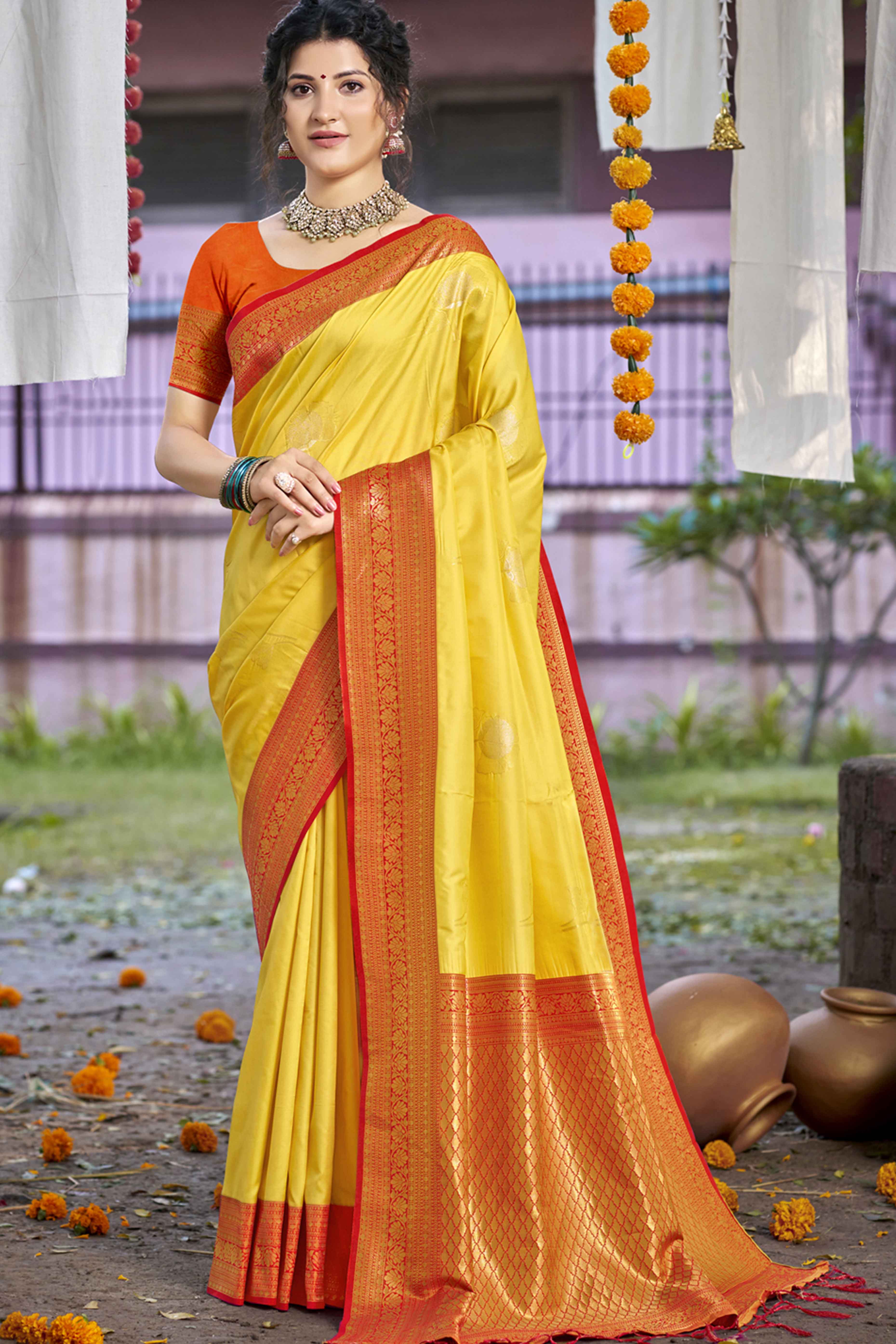 Yellow Floral Woven Banarasi Silk Saree With Tassels