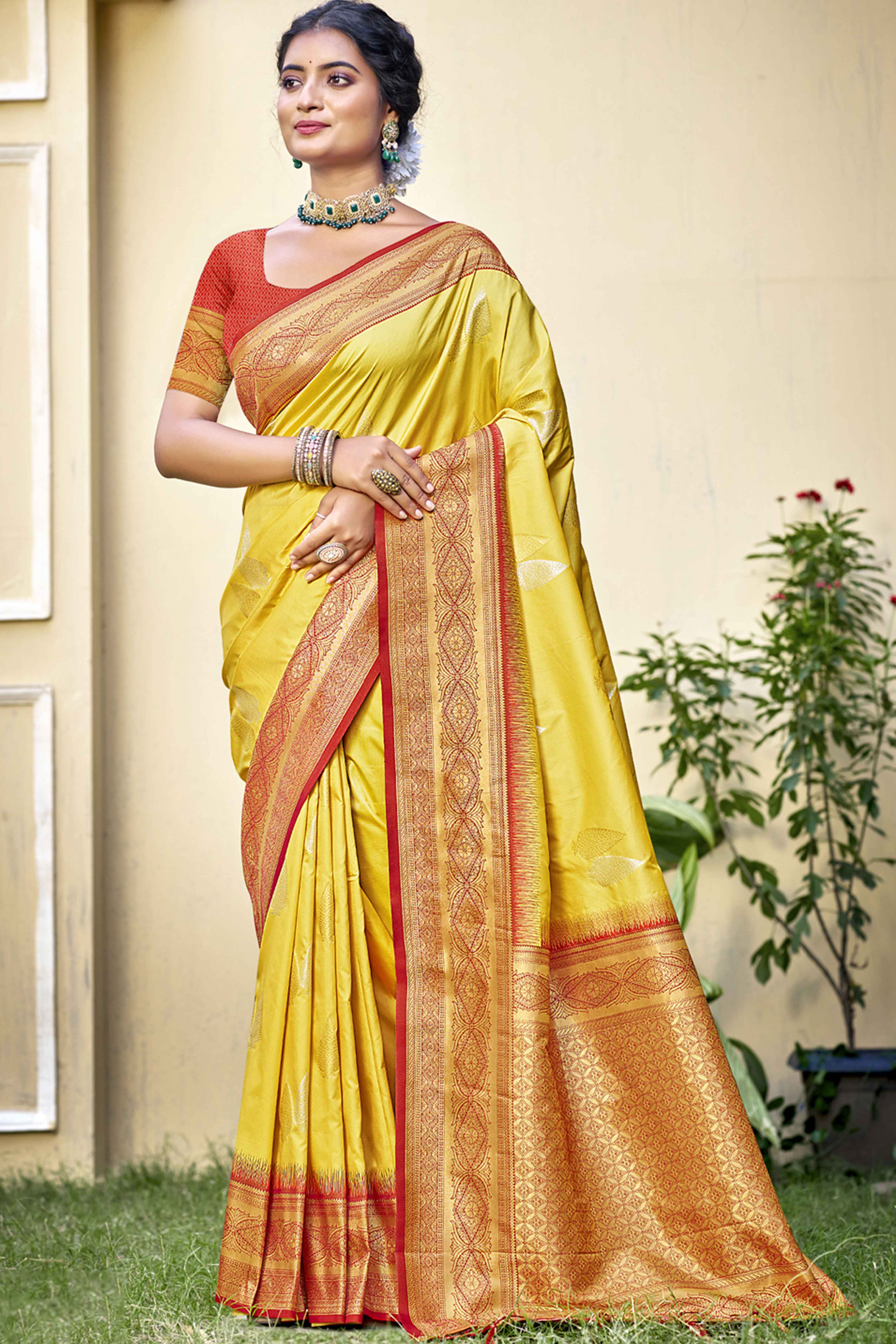 Yellow Woven Banarasi Silk Saree With Tassels