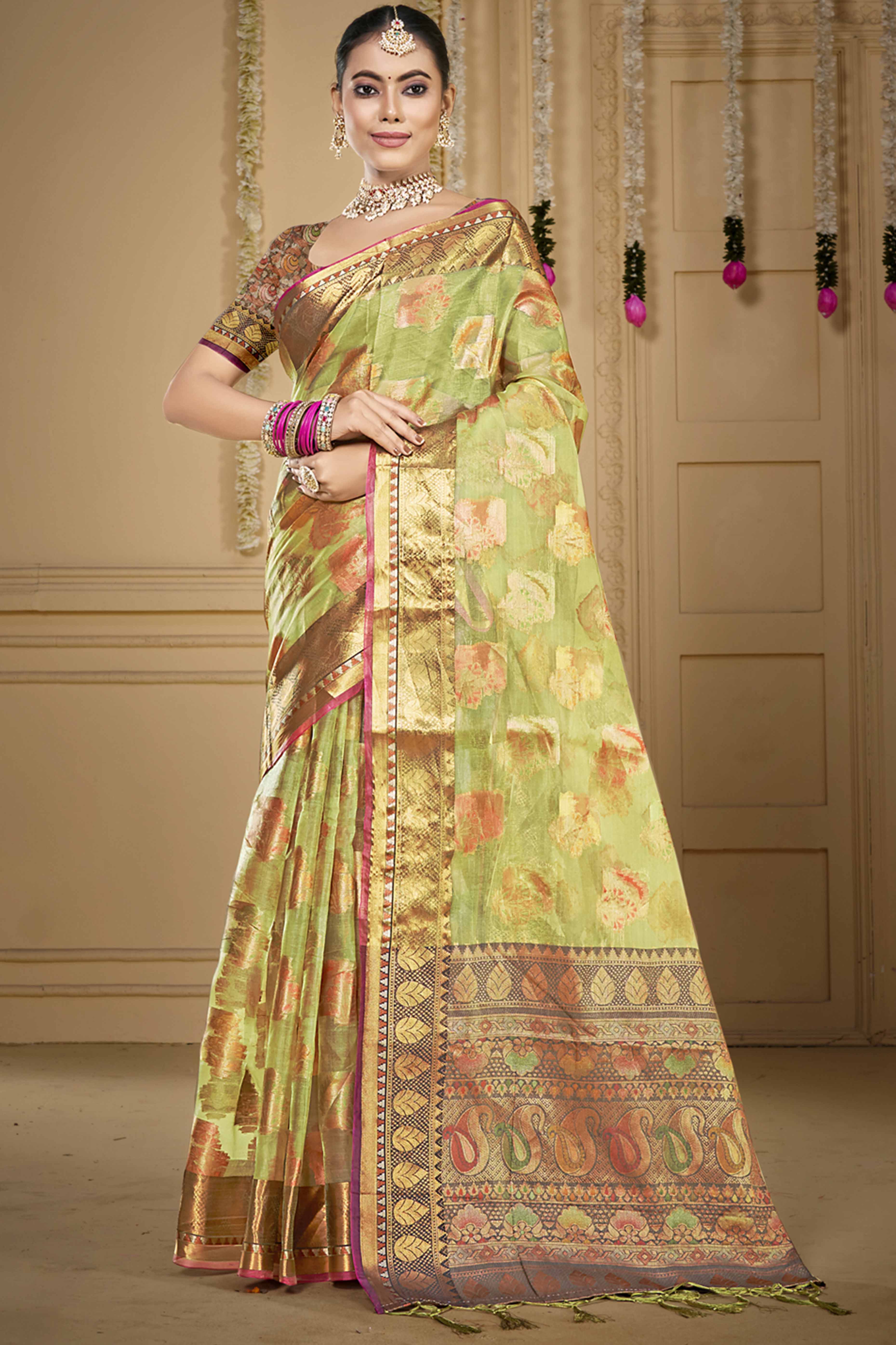 Light Green Floral Woven Organza Saree With Tassels