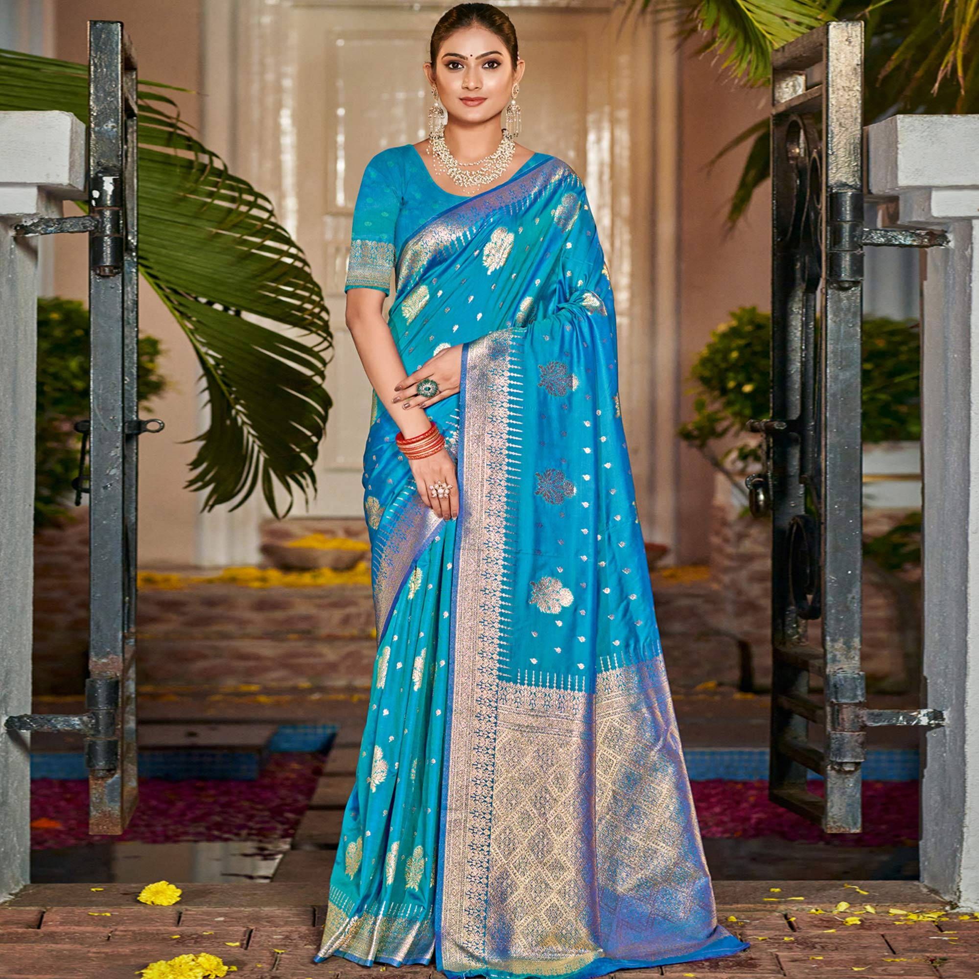 Blue Floral Woven Banarasi Silk Saree With Tassels