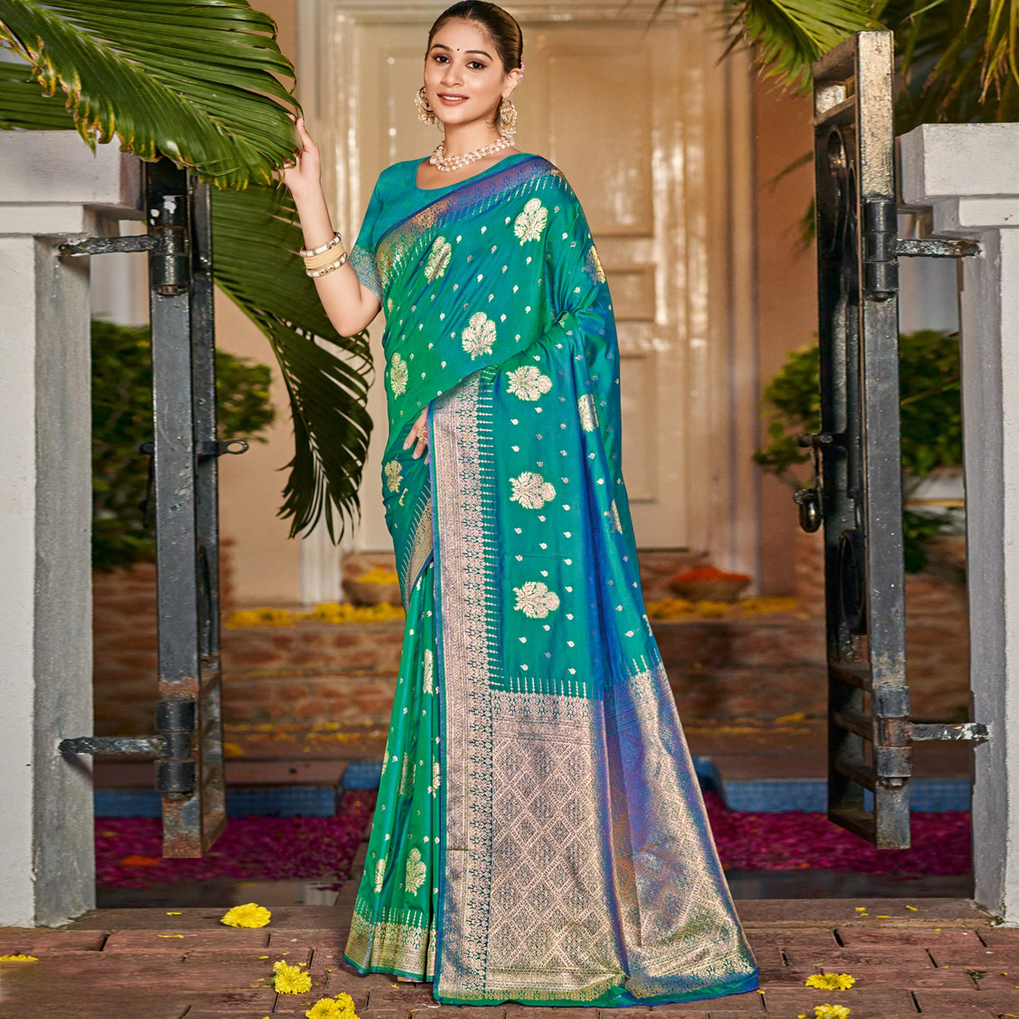 Rama Green Floral Woven Banarasi Silk Saree With Tassels