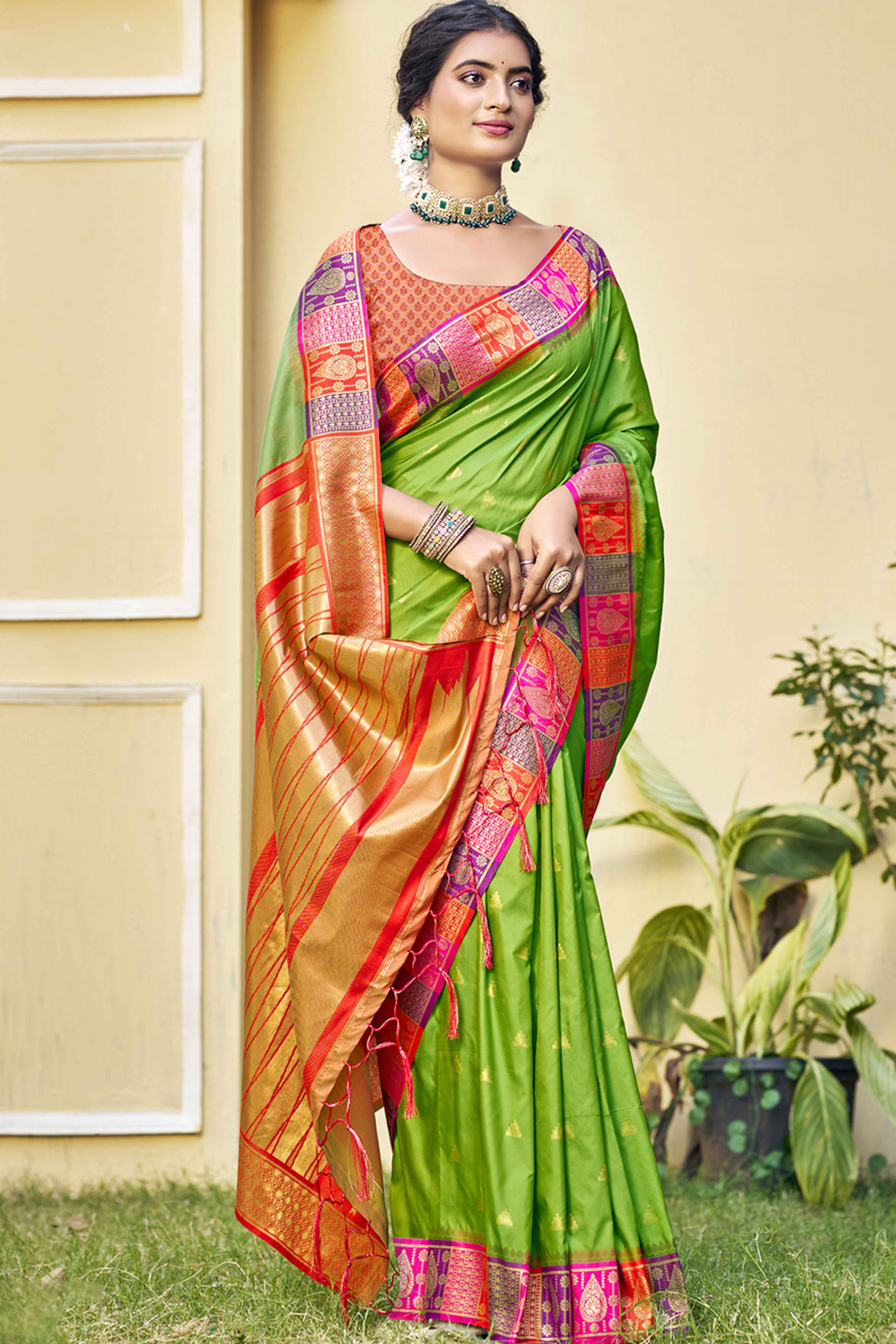 Green Woven Banarasi Silk Saree With Tassels