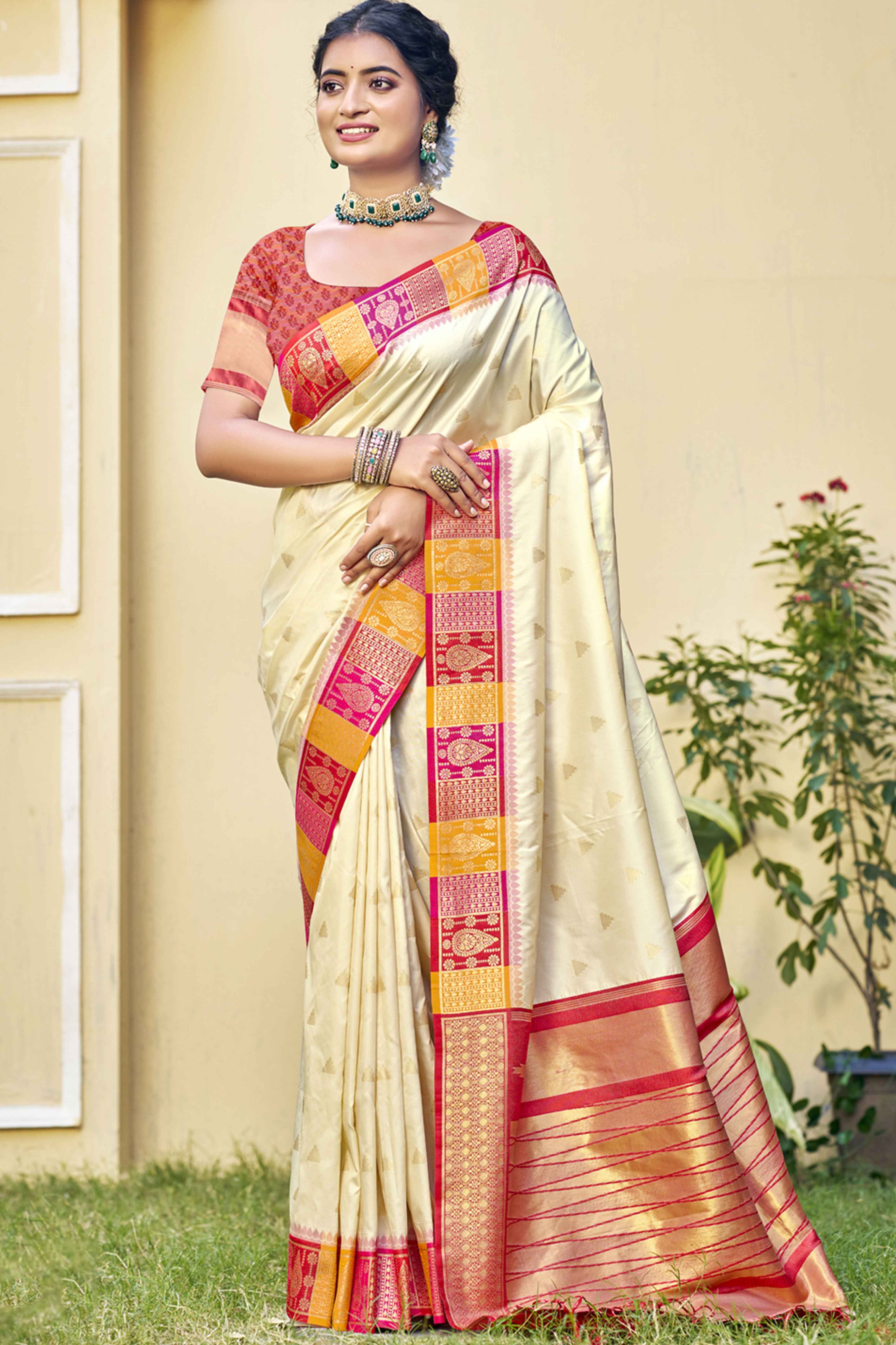 Cream Woven Banarasi Silk Saree With Tassels