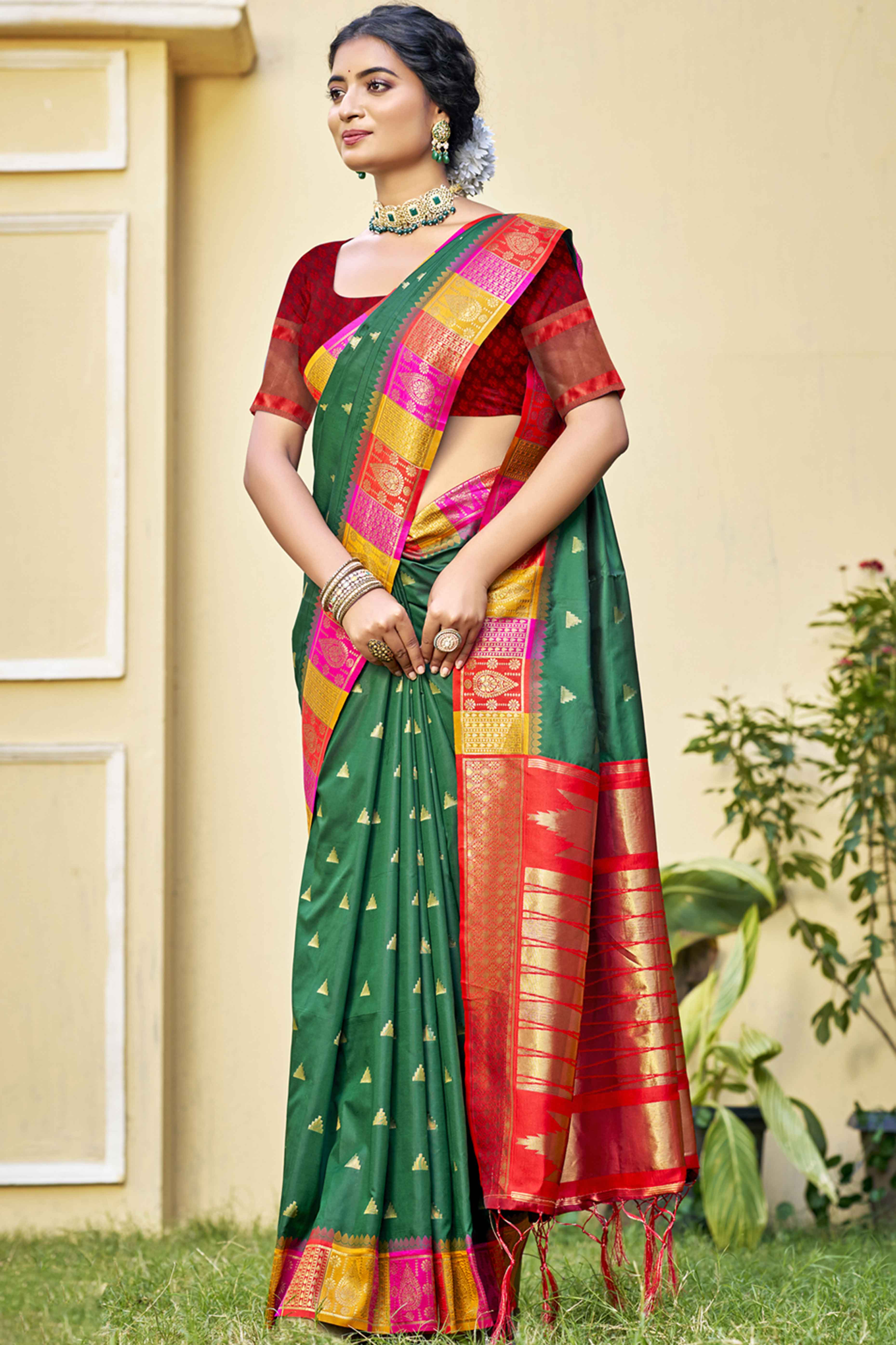 Green Woven Banarasi Silk Saree With Tassels