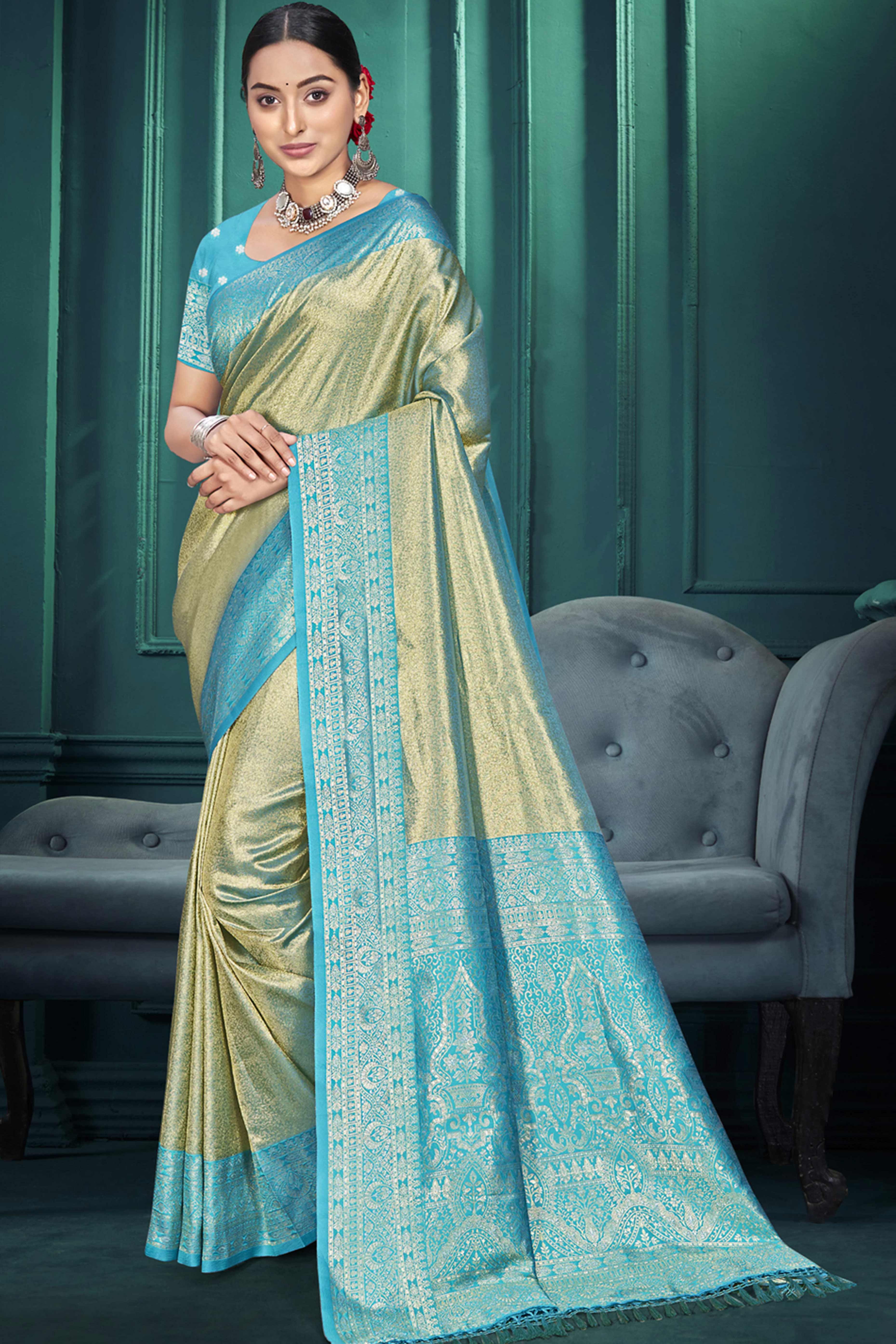 Exclusive Sage Green Floral Motif Woven Kanjivaram Silk Saree With Graceful Tassel Pallu