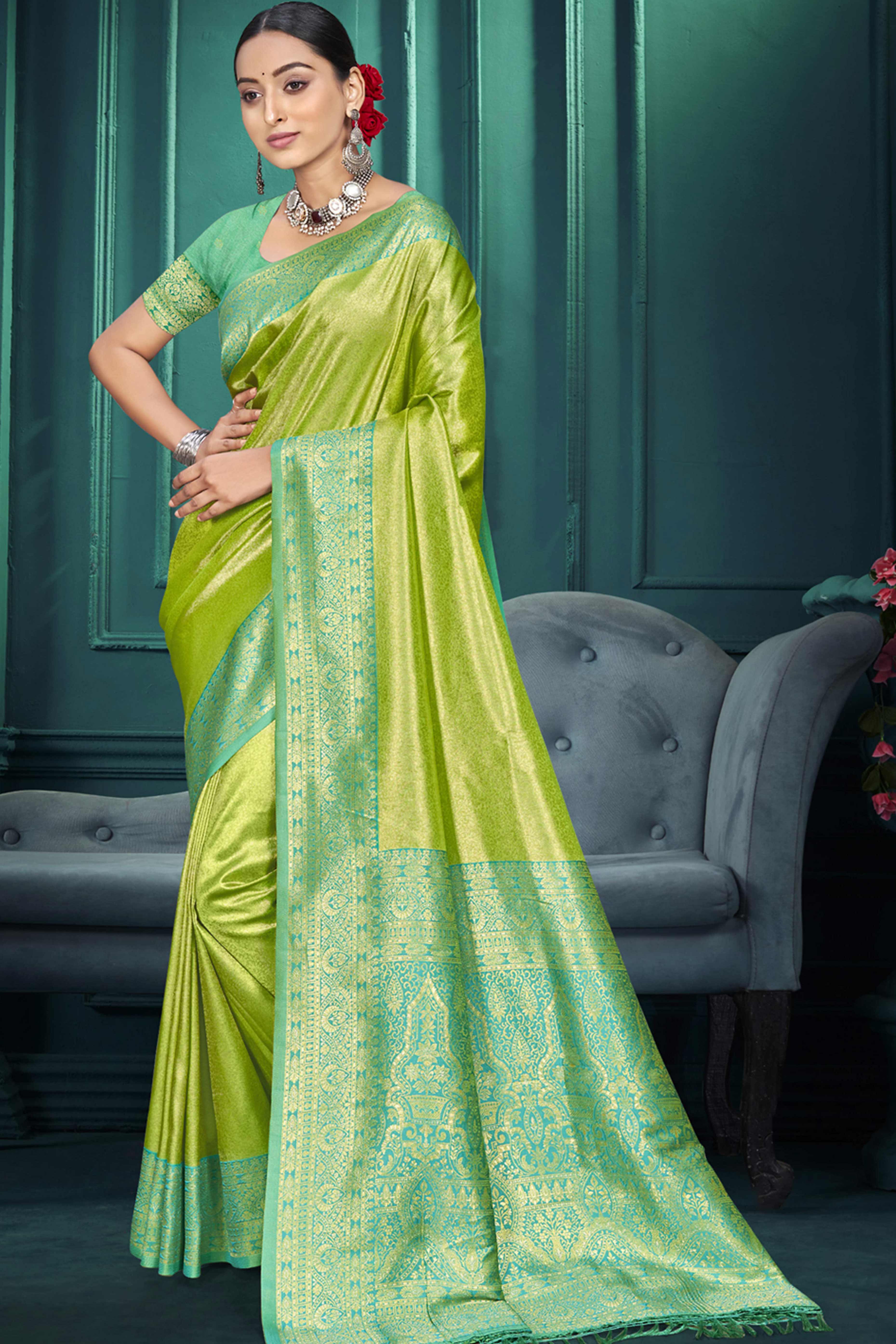Exclusive Parrot Green Floral Motif Woven Kanjivaram Silk Saree With Graceful Tassel Pallu