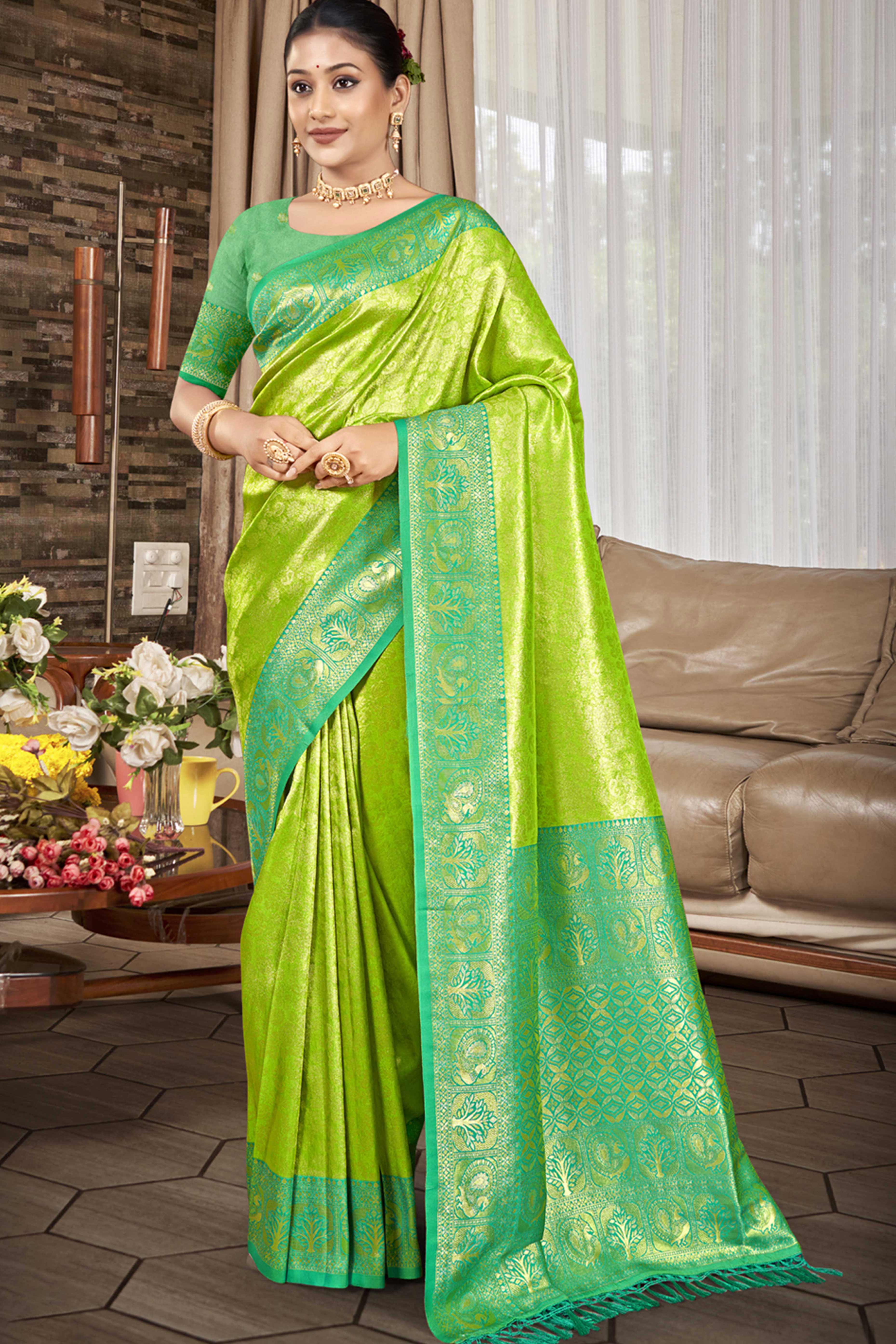 Premium Green Floral and Peacock Motif Woven Kanjivaram Silk Saree With Tassel Pallu