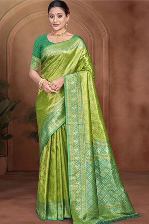 Exclusive Green Paisley & Floral Pattern Weaving Kanjivaram Silk Saree With Tassel Pallu