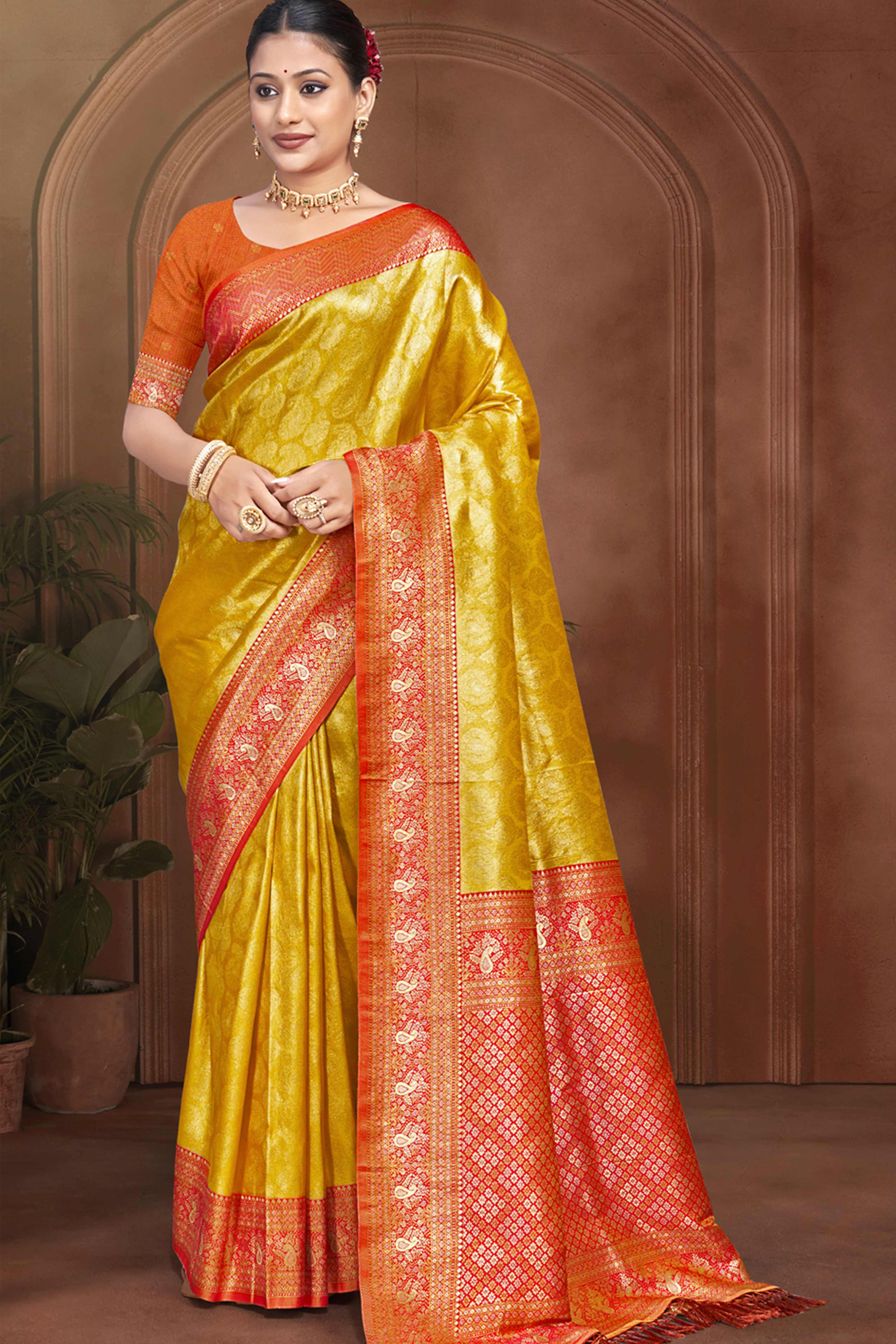 Exclusive Yellow Paisley & Floral Pattern Weaving Kanjivaram Silk Saree With Tassel Pallu