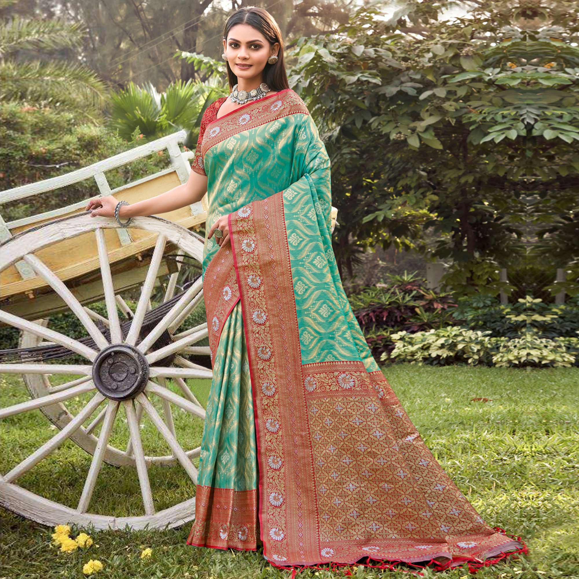 Turquoise Woven Banarasi Silk Saree With Tassels