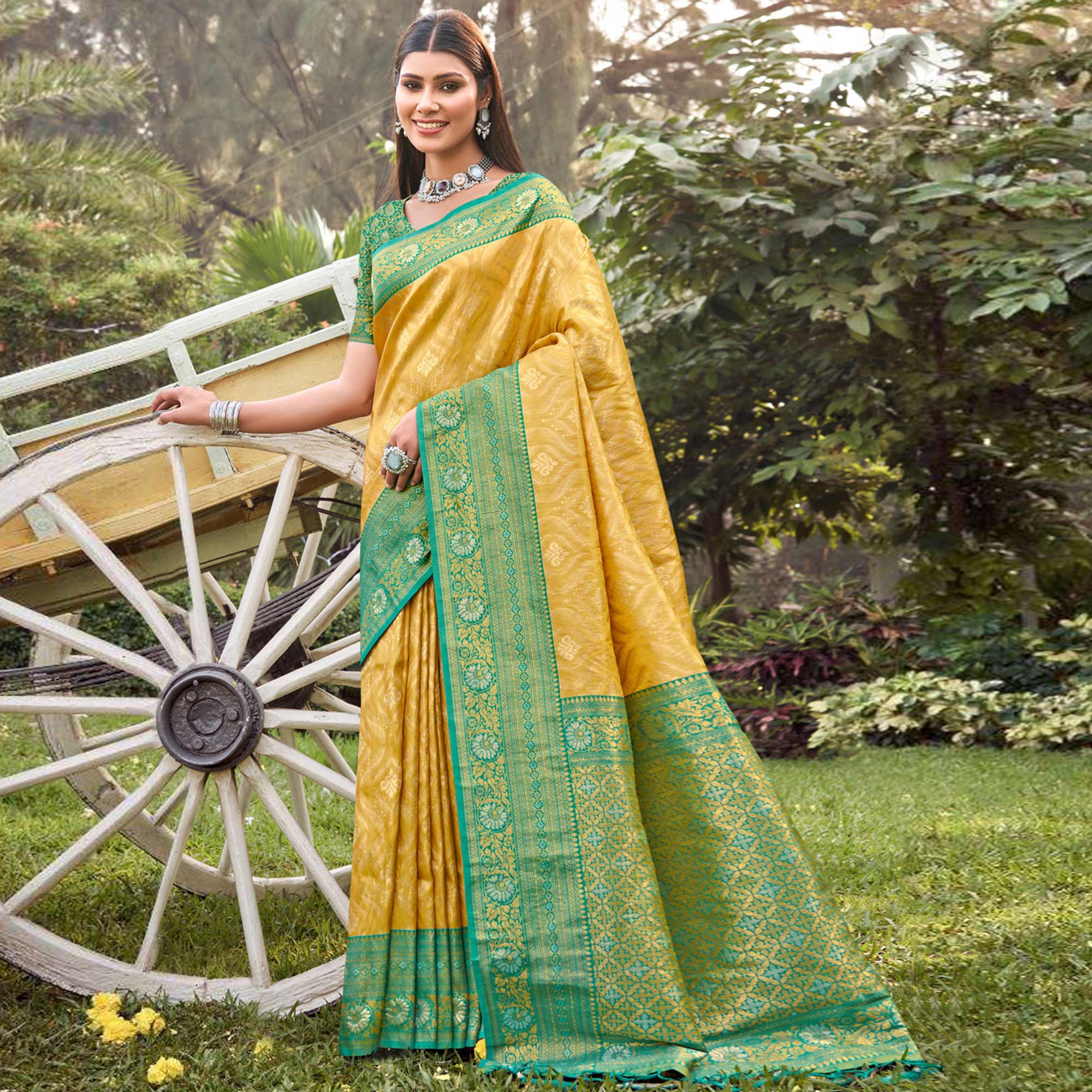 Yellow Woven Banarasi Silk Saree With Tassels