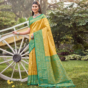 Yellow Woven Banarasi Silk Saree With Tassels