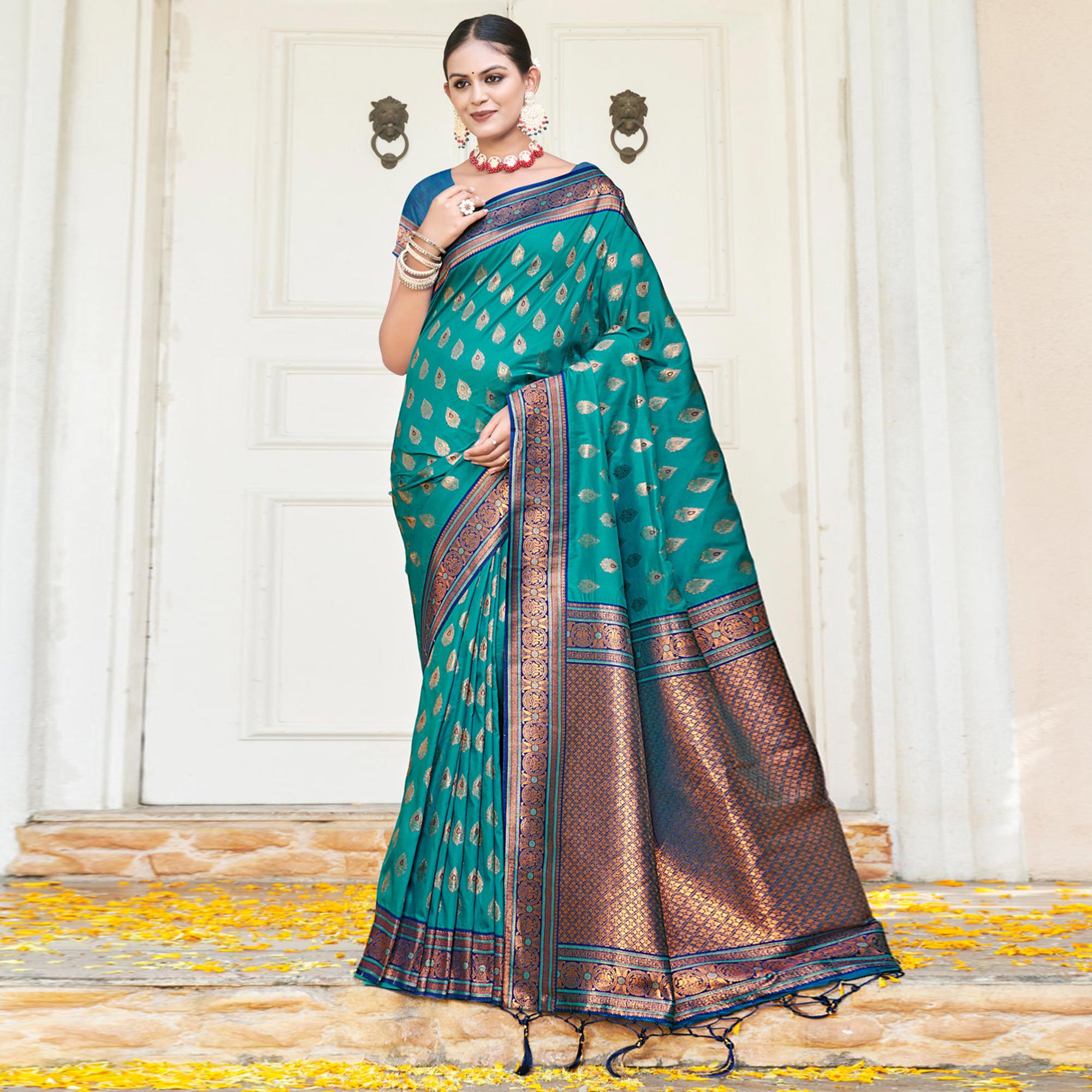 Rama Blue Woven Banarasi Silk Saree With Tassels