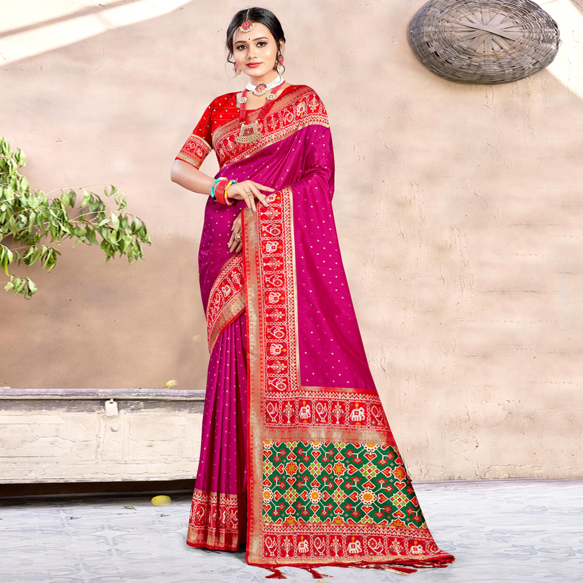 Magenta Pink Woven Patola Banarasi Silk Saree With Tassels