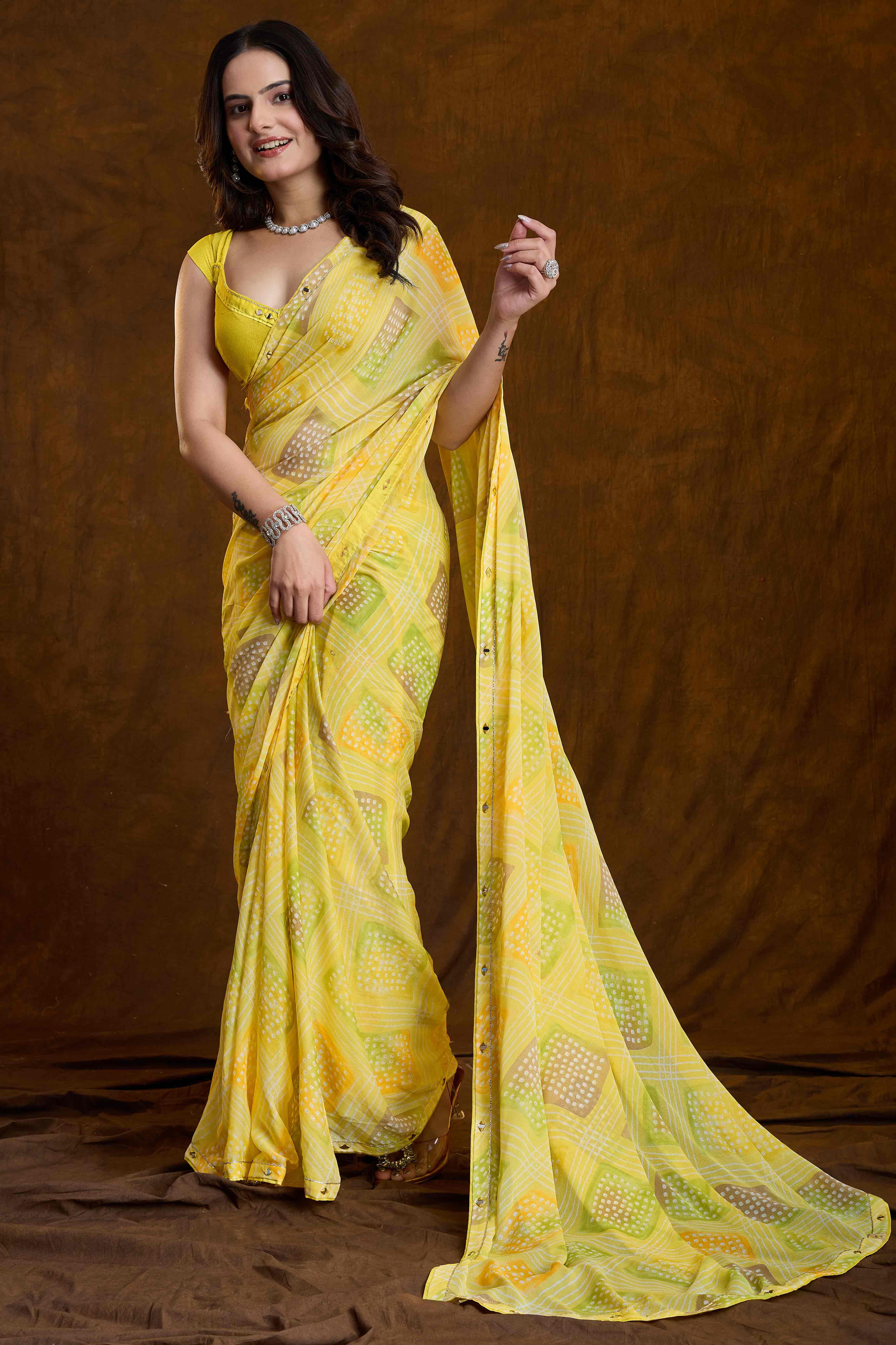 Lemon Yellow Bandhani Printed Chiffon Saree With Sparkling Mirror Work Border