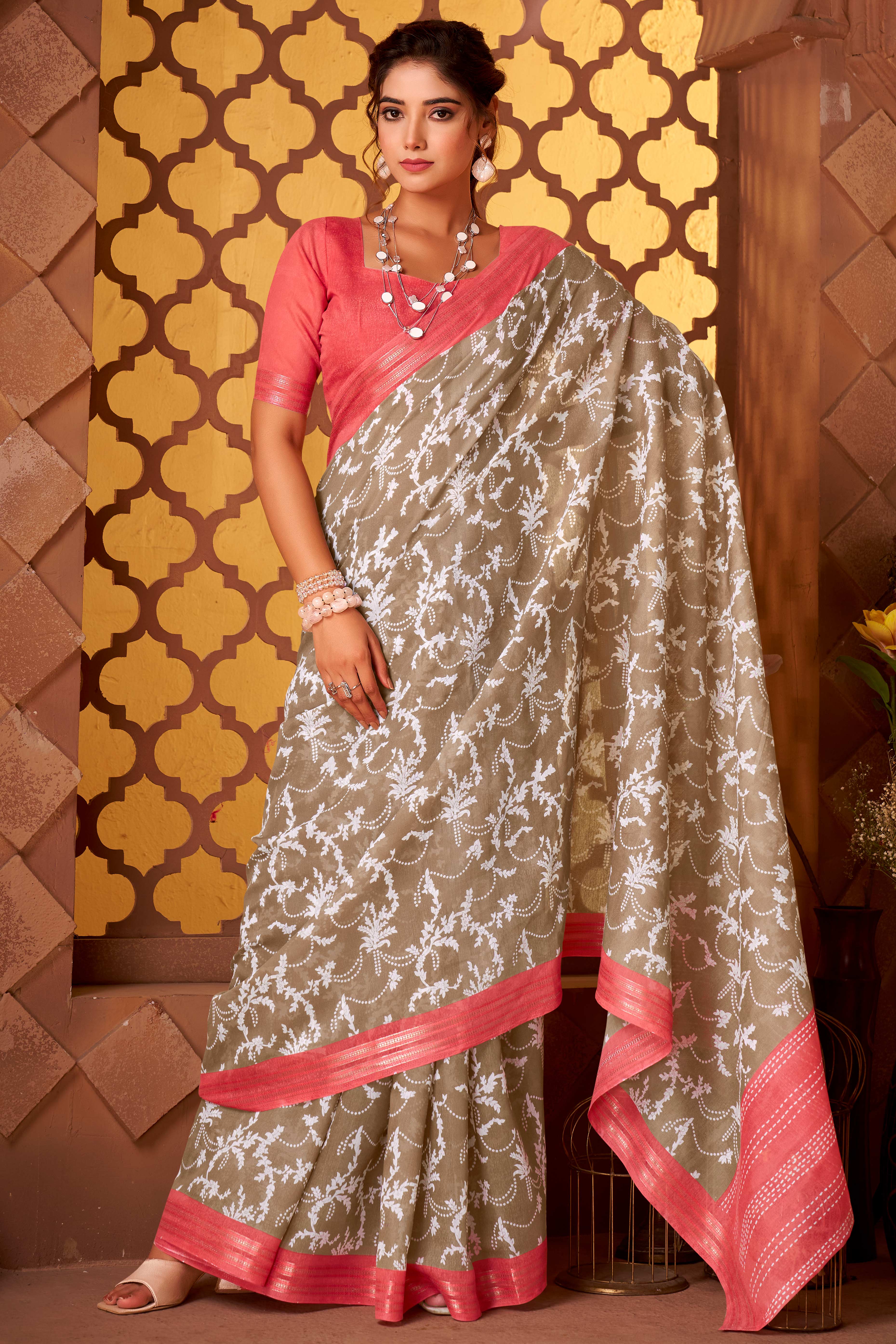 Sophisticated Brown Mulmul Cotton Saree Featuring Delicate Floral Prints & Weaving Border