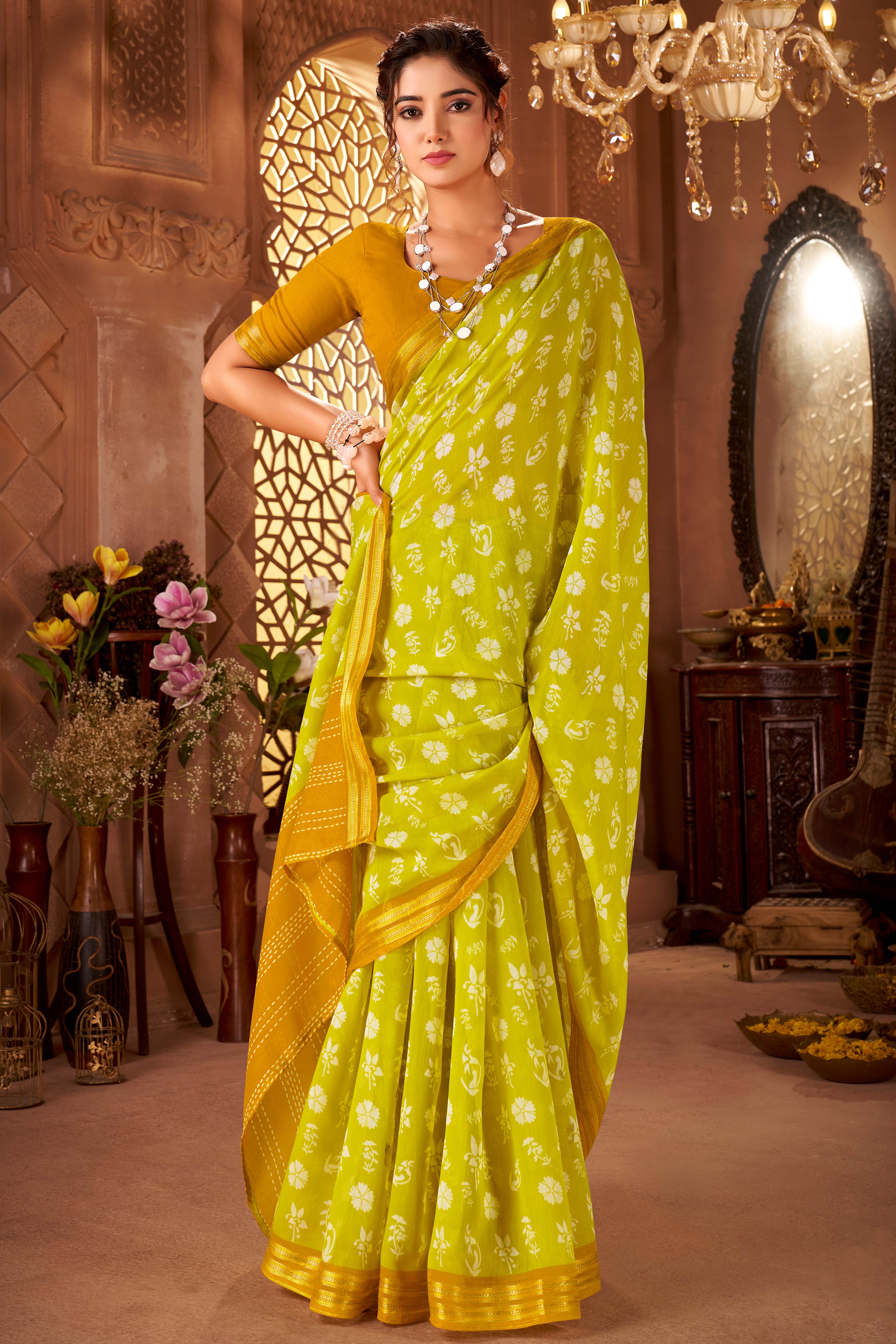 Sophisticated Lemon Green Mulmul Cotton Saree Featuring Delicate Floral Prints & Weaving Border