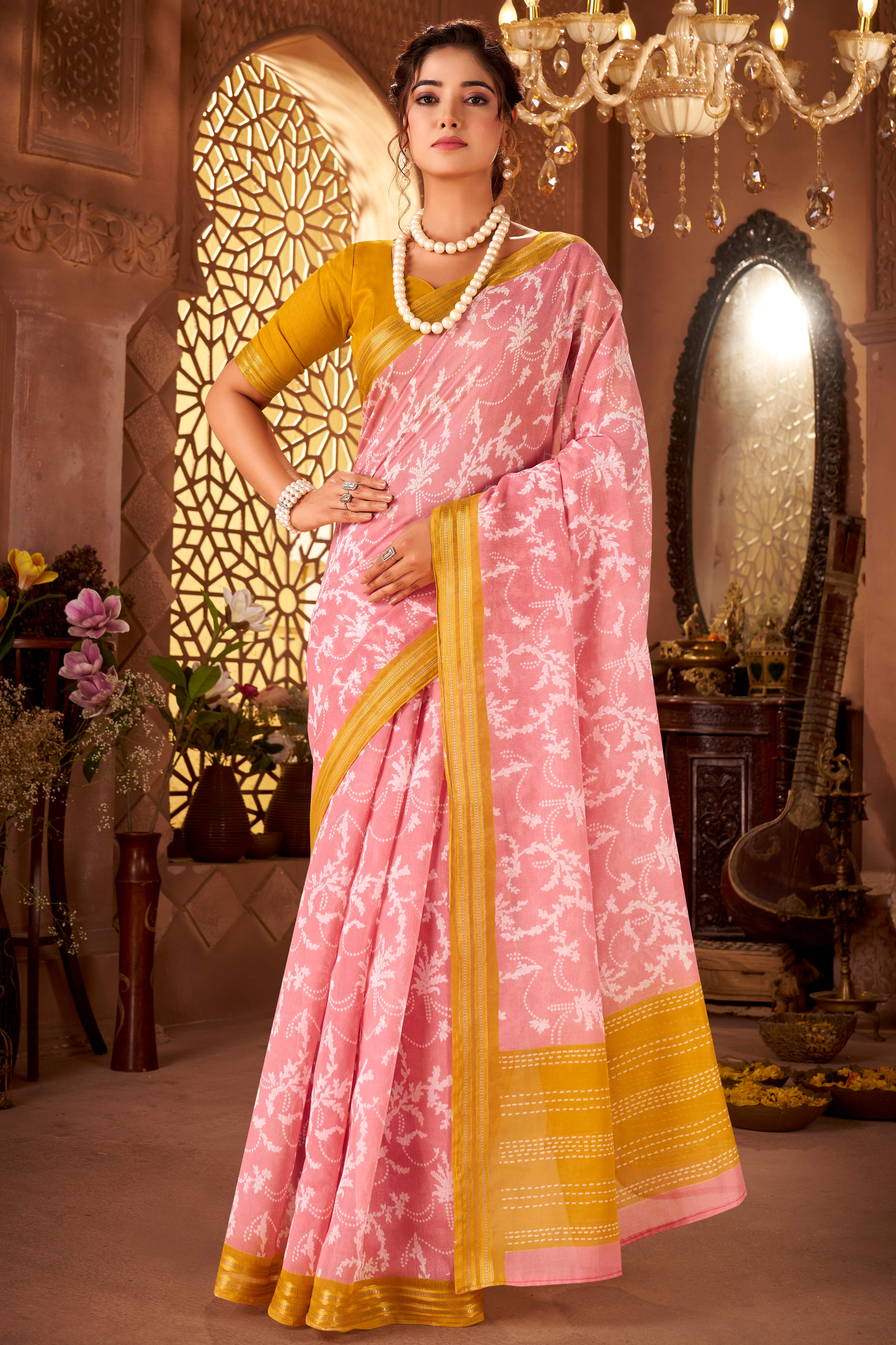 Sophisticated Baby Pink Mulmul Cotton Saree Featuring Delicate Floral Prints & Weaving Border