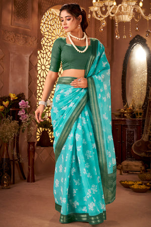 Sophisticated Turquoise Mulmul Cotton Saree Featuring Delicate Floral Prints & Weaving Border
