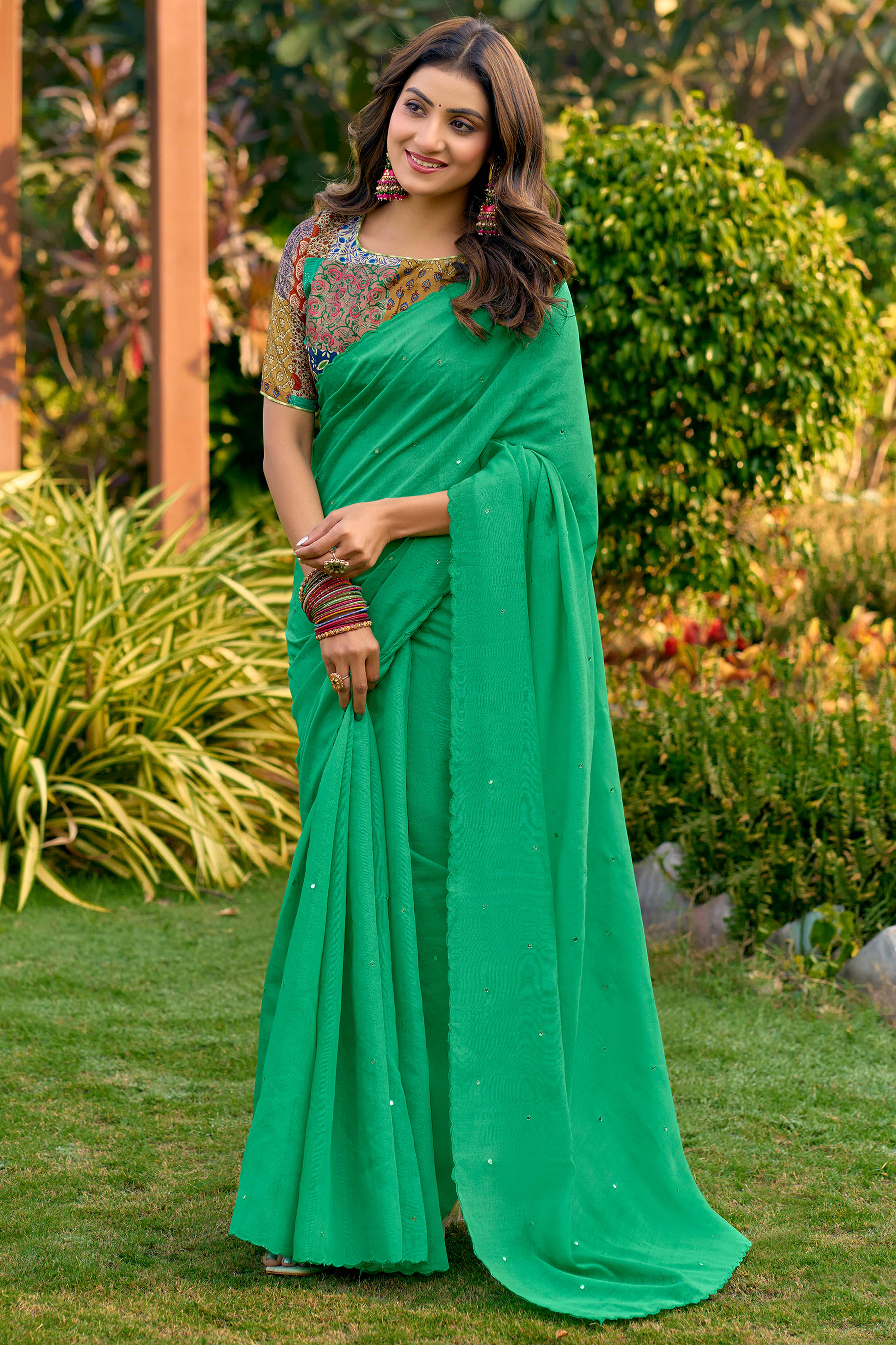 Timeless Mint Green Cotton Blend Drape Highlighted With Shimmering Mirror Embroidery Work