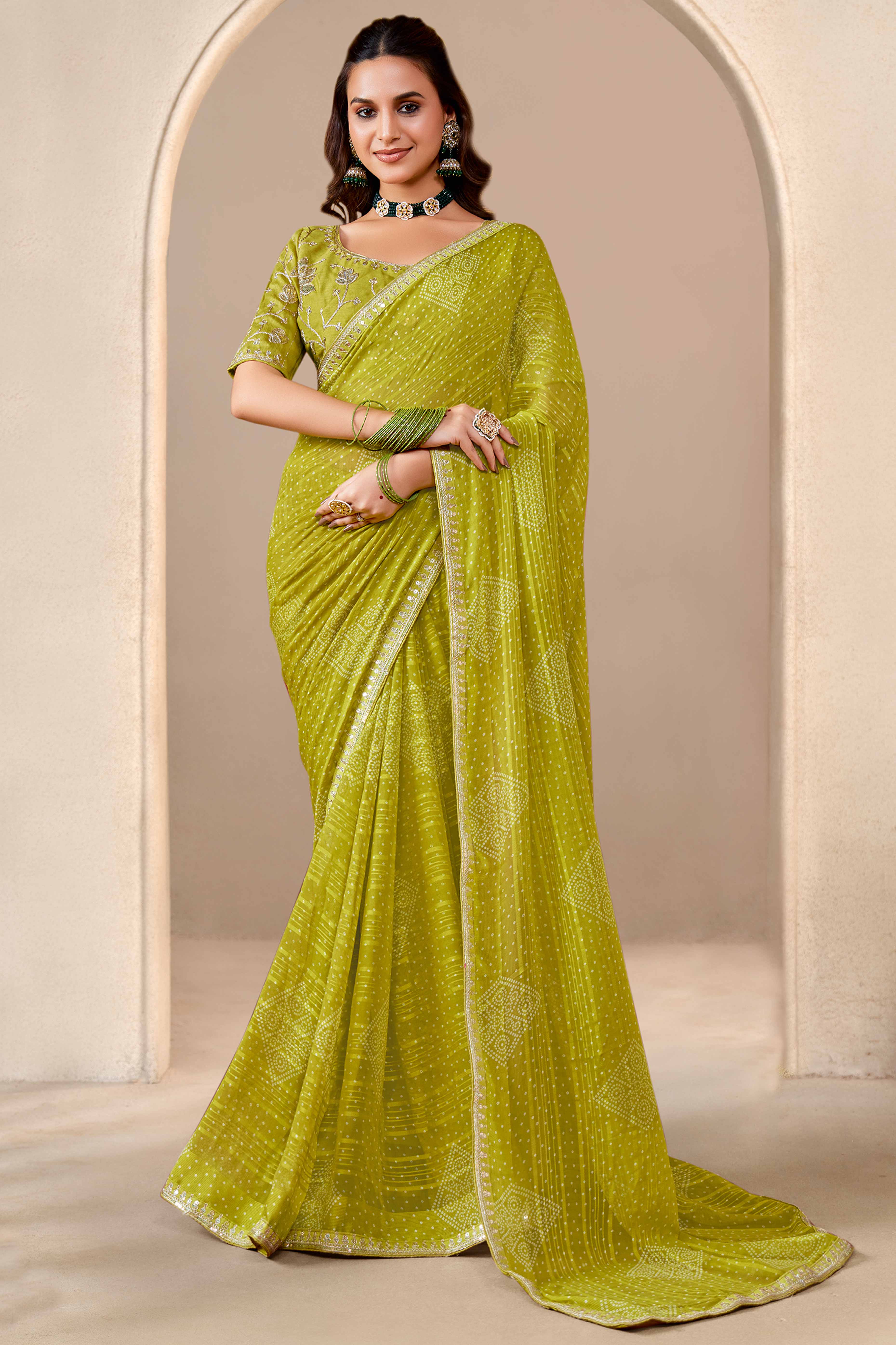 Green Bandhani Printed Georgette Saree Enhanced With Sequins & Cording Embroidered Lace Border