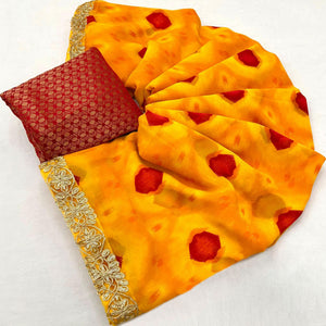 Orange Bandhani Printed Georgette Saree With Sequins Border