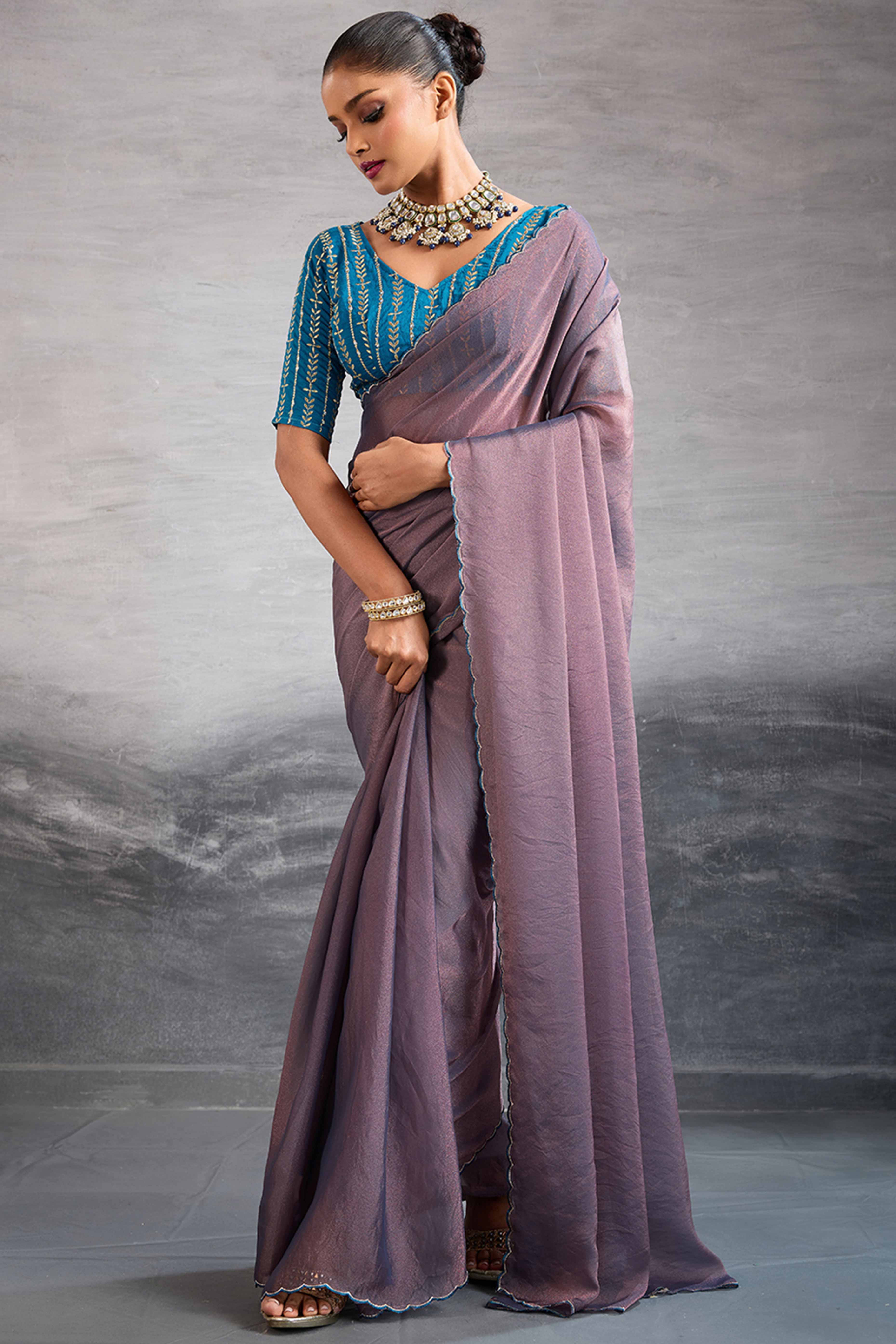 Mauve Solid Organza Jimmy Choo Saree Accentuated With Elegant Cutwork Border Detailing