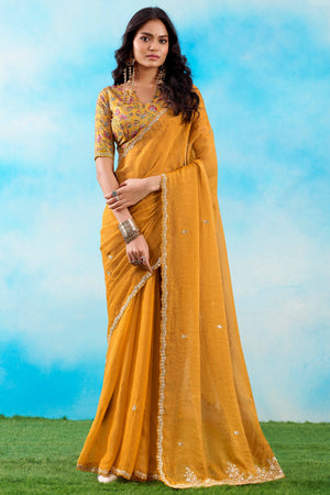 Luxurious Mustard Chiffon Saree Showcasing Floral Sequins Embroidery In A Two Tone Finish
