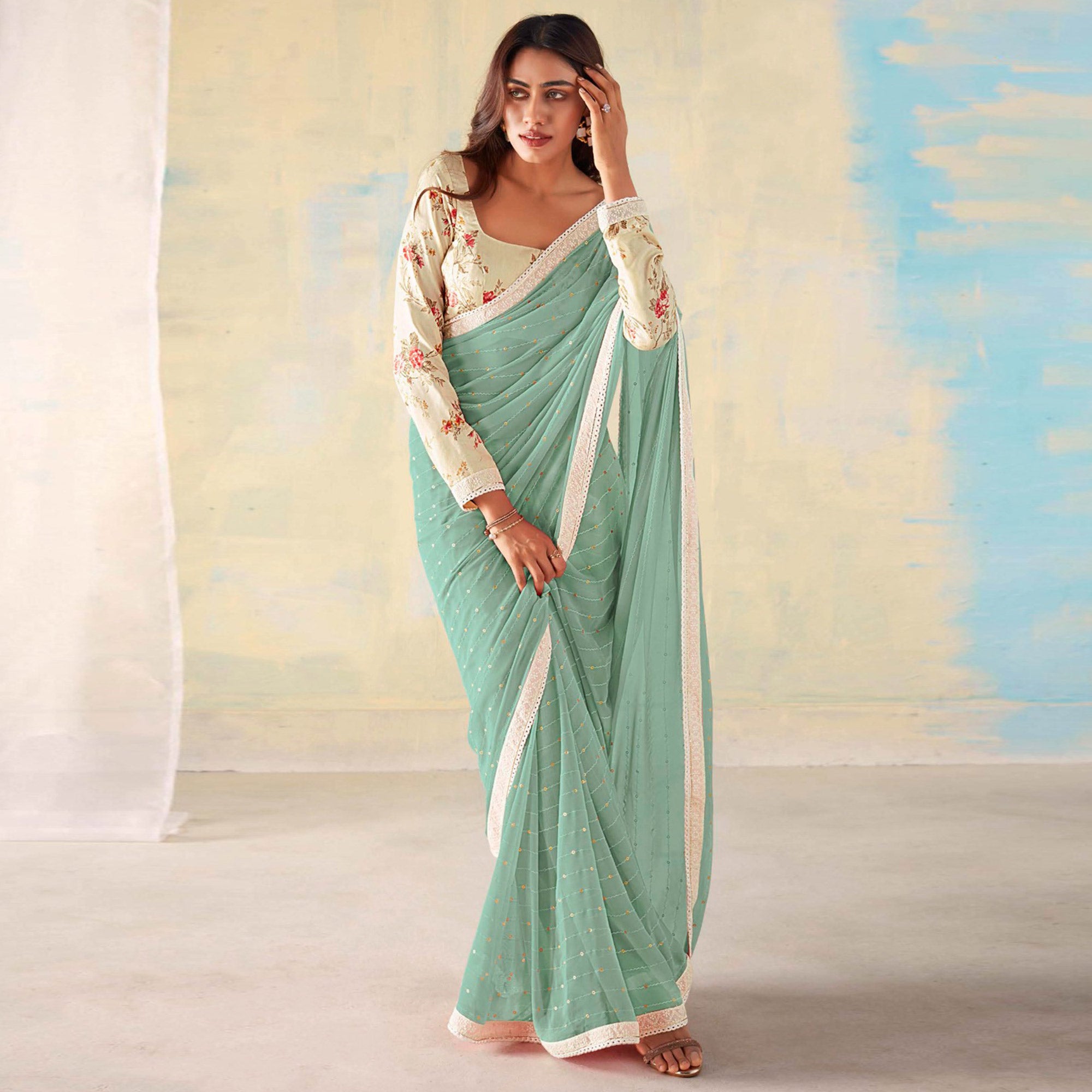 Dusty Green Foil Printed Georgette Saree With Embroidered Border