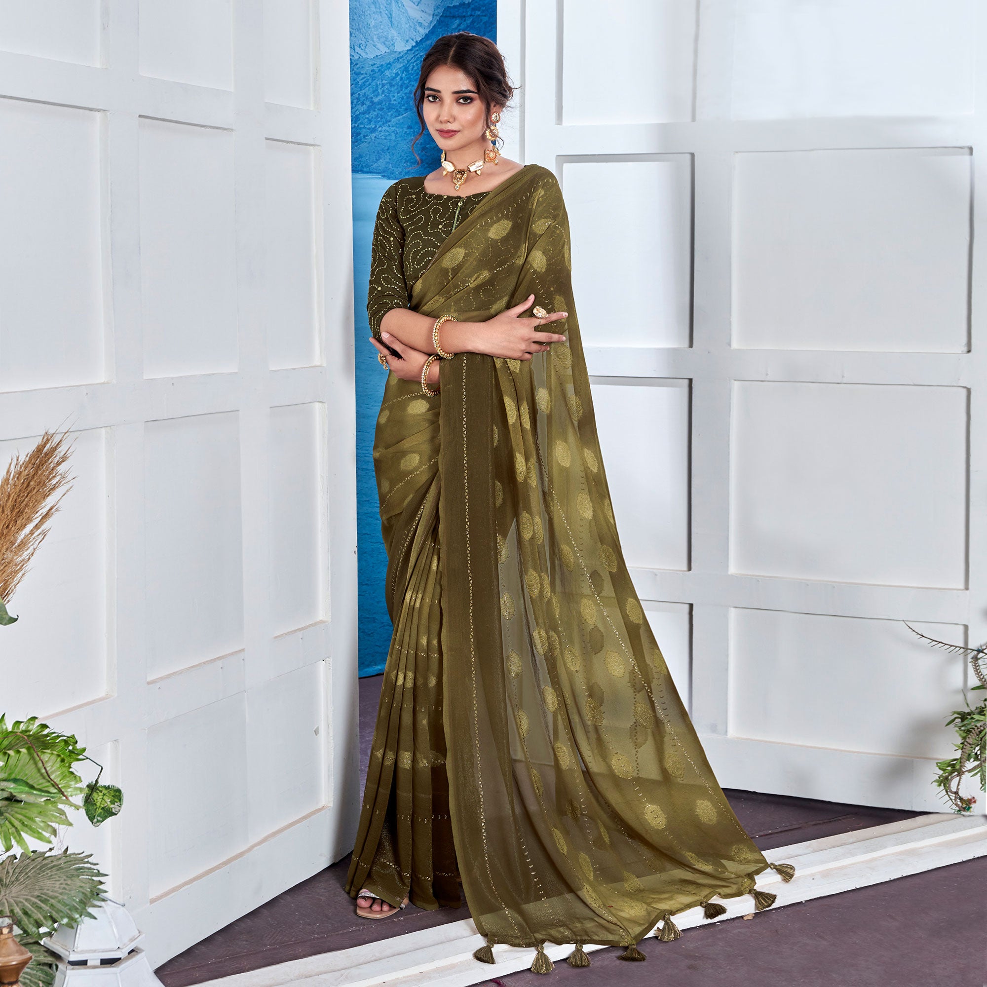 Mehendi Green Woven Fancy Fabric Saree With Tassels