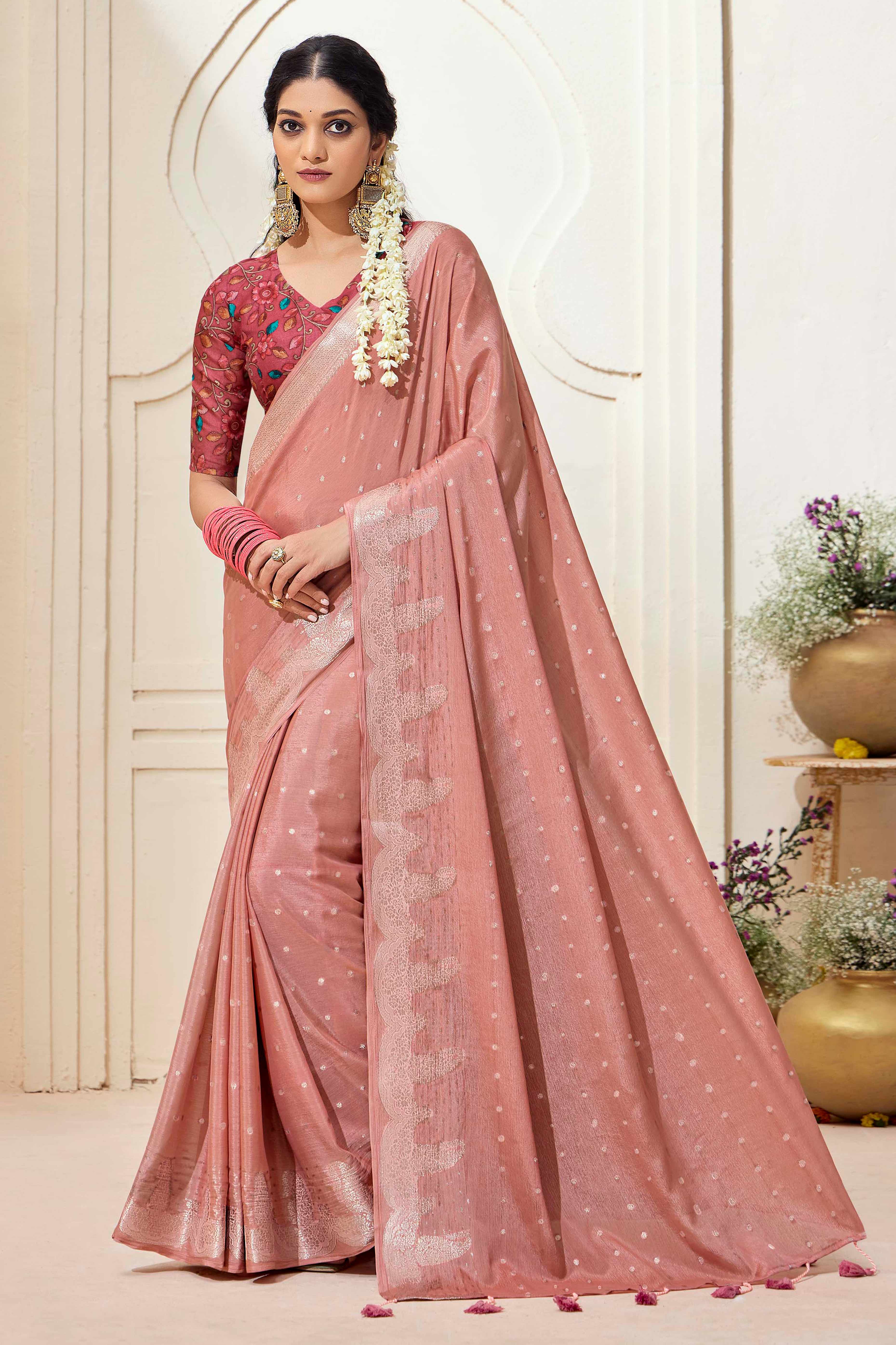Peach Chinon Saree with Jacquard Weaving and Delicate Tassel Accents