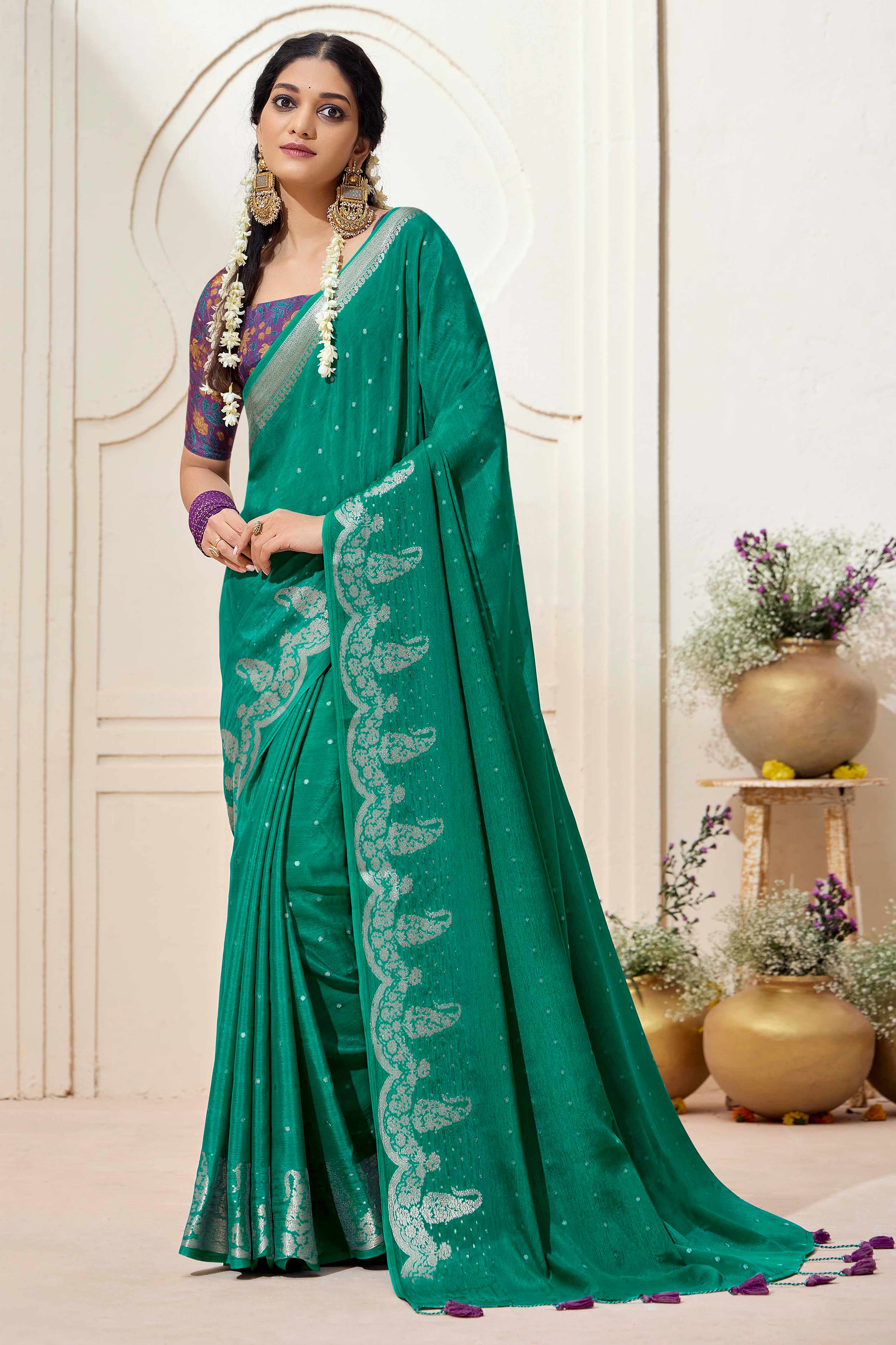 Rama Green Chinon Saree with Jacquard Weaving and Delicate Tassel Accents
