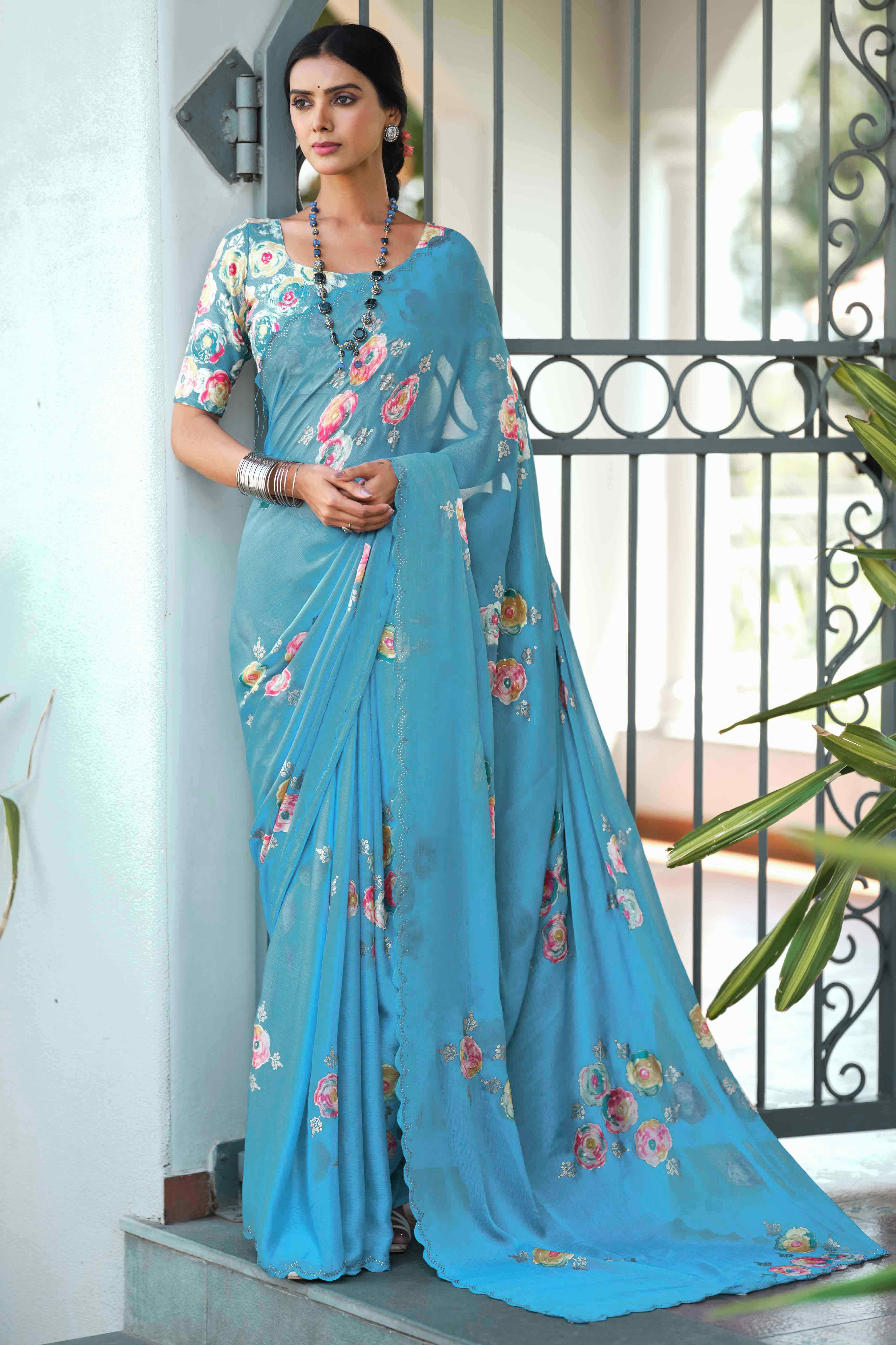 Elegant Blue Chiffon Saree with Floral and Foil Print Detailing