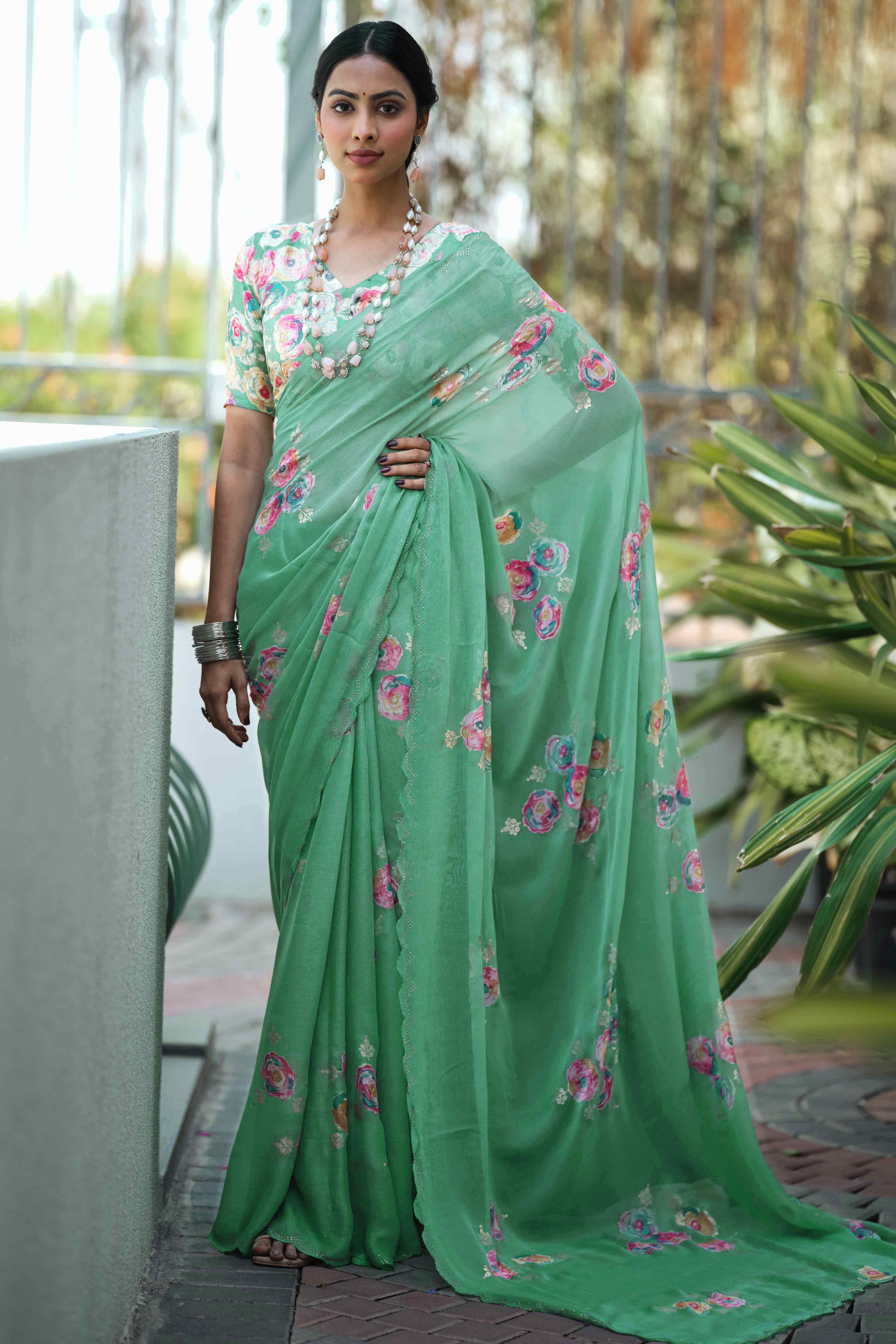 Elegant Sea Green Chiffon Saree with Floral and Foil Print Detailing