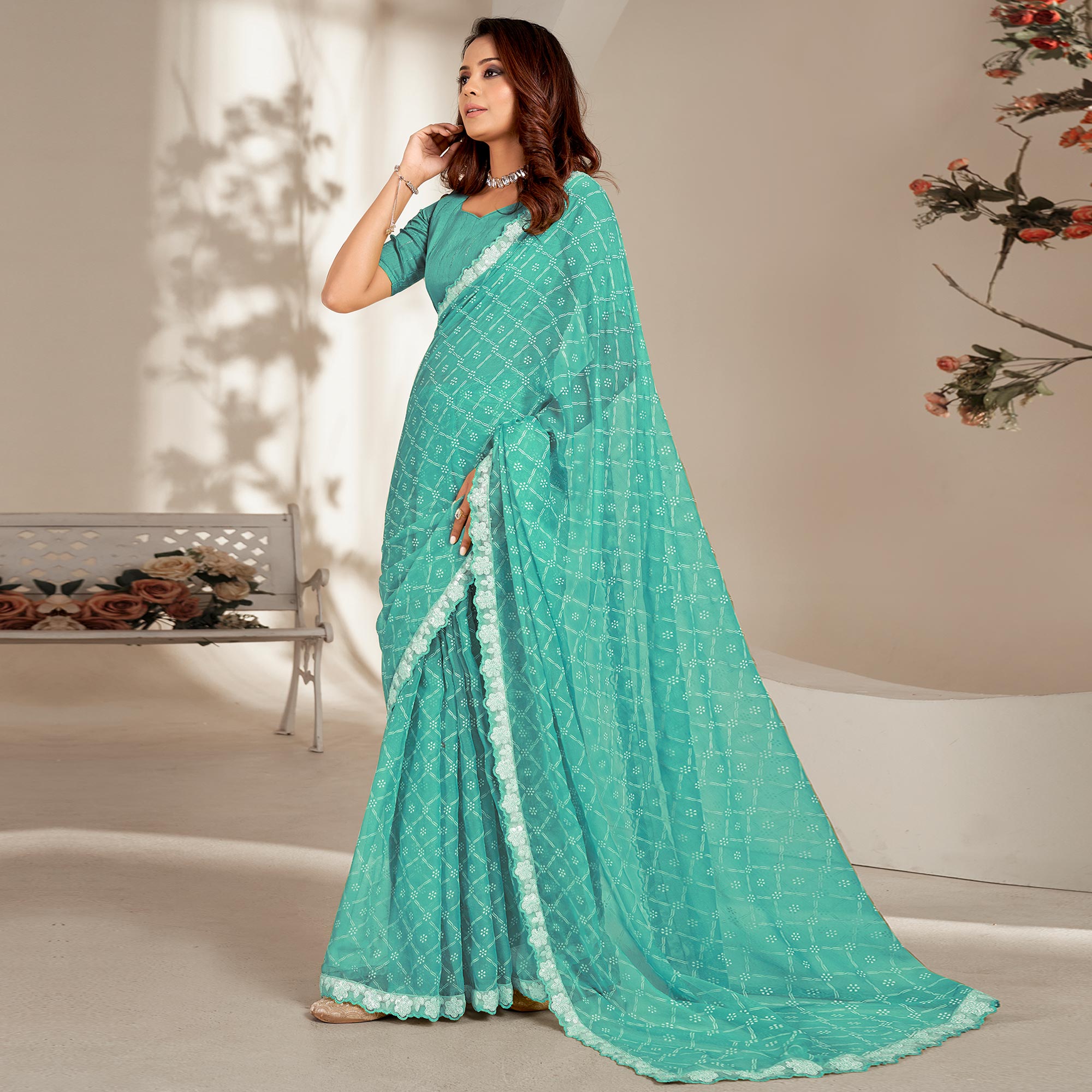 Turquoise Floral Printed Chiffon Saree With Embroidered Border